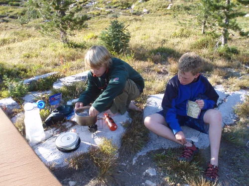 Lars was the patrol leader for this campsite, so he started the stove, and cooked the food, and supervised the dishes and camp clean up.