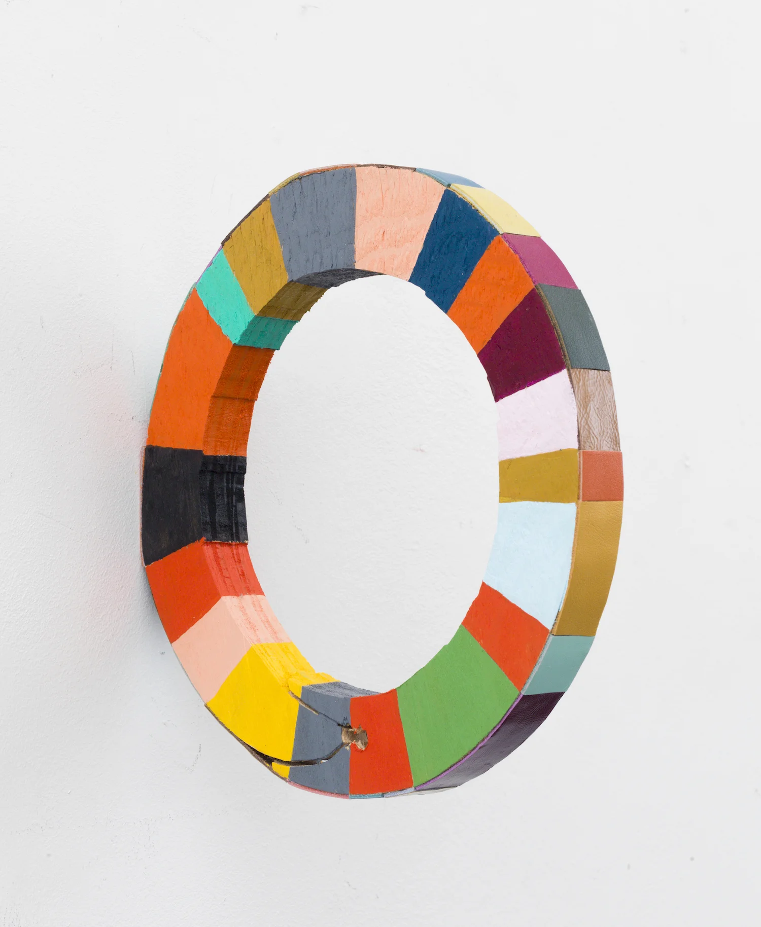   wonderwheel , 2012, acrylic and leather on wood, 8" x 1" x 8" 