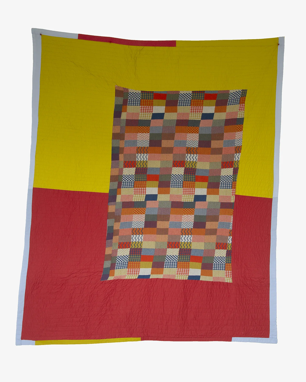   Simple Sample, 2018, machine-pieced and hand-quilted cotton, knitwear sampler, bedsheet, and African Dutch Wax fabric, 83" x 70" 