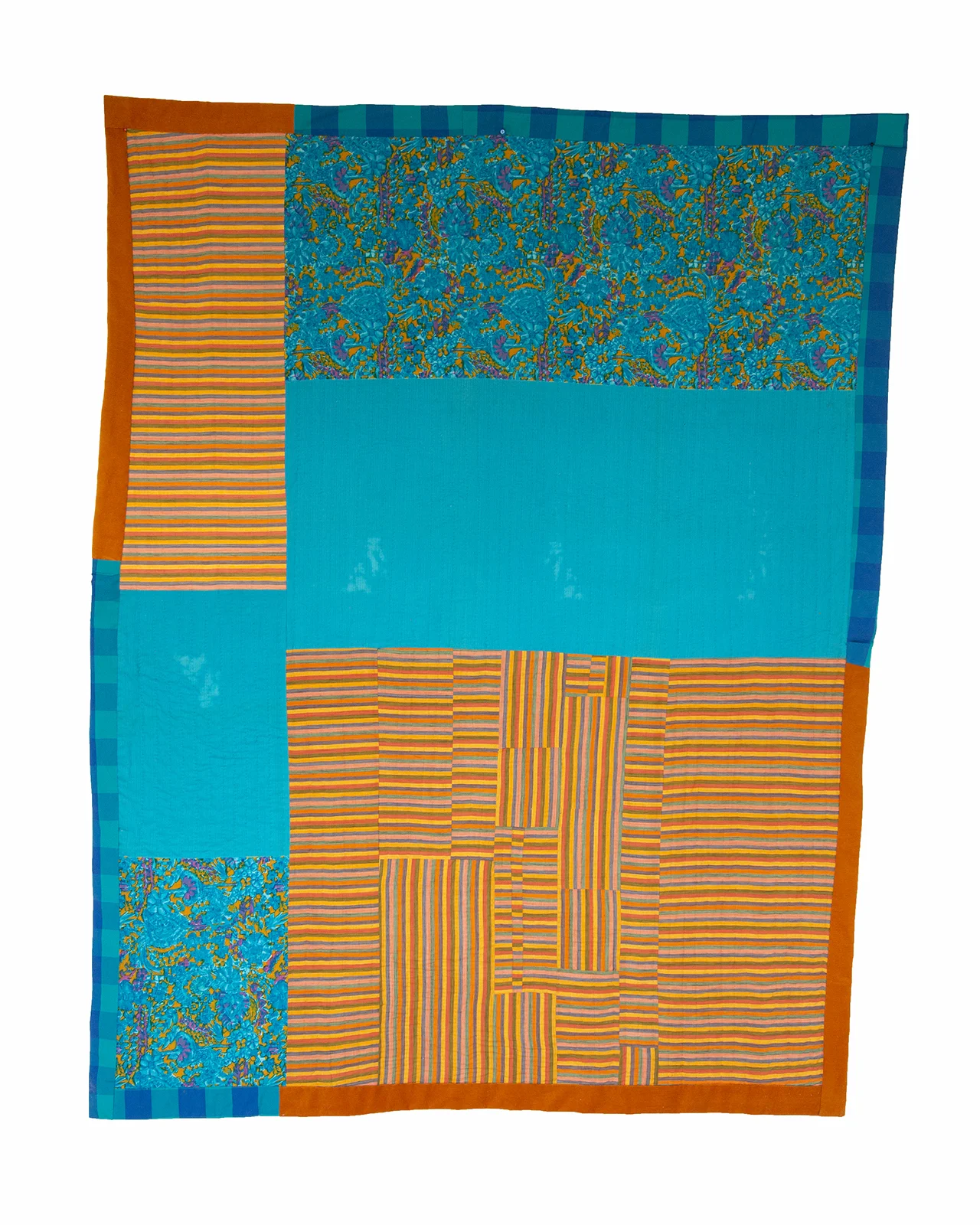 23, 2018 Machine-pieced and hand-quilted skirt (fabric panel from Gabon), striped cotton, plaid synthetic fabric, and corduroy, 73" x 57"