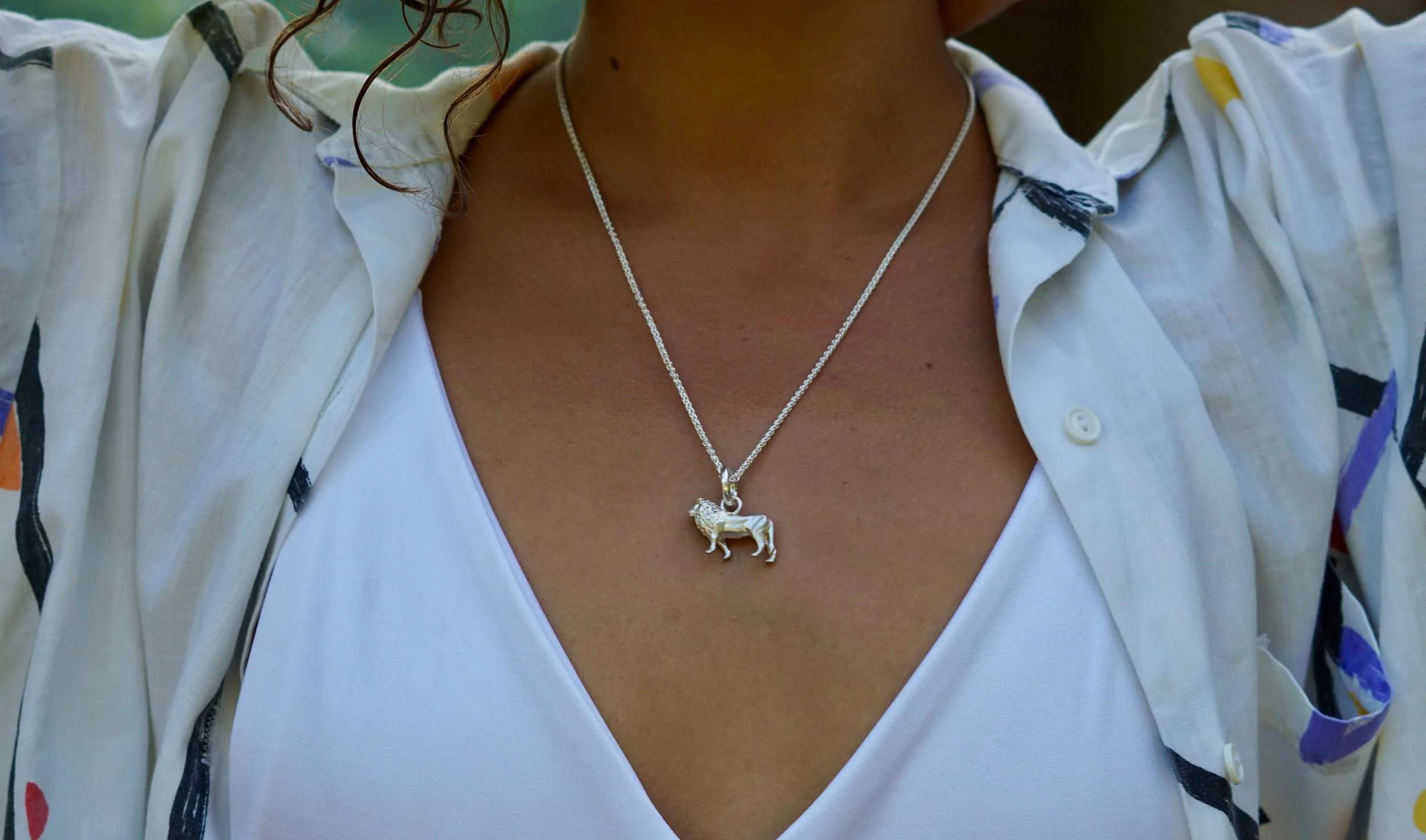 AnimalStone’s Cecil the Lion Pendant. For each sale of a solid sterling silver Cecil the Lion pendant, AnimalStone will donate $15 CAD to Wild Tomorrow Fund to support our Lion Protection work.