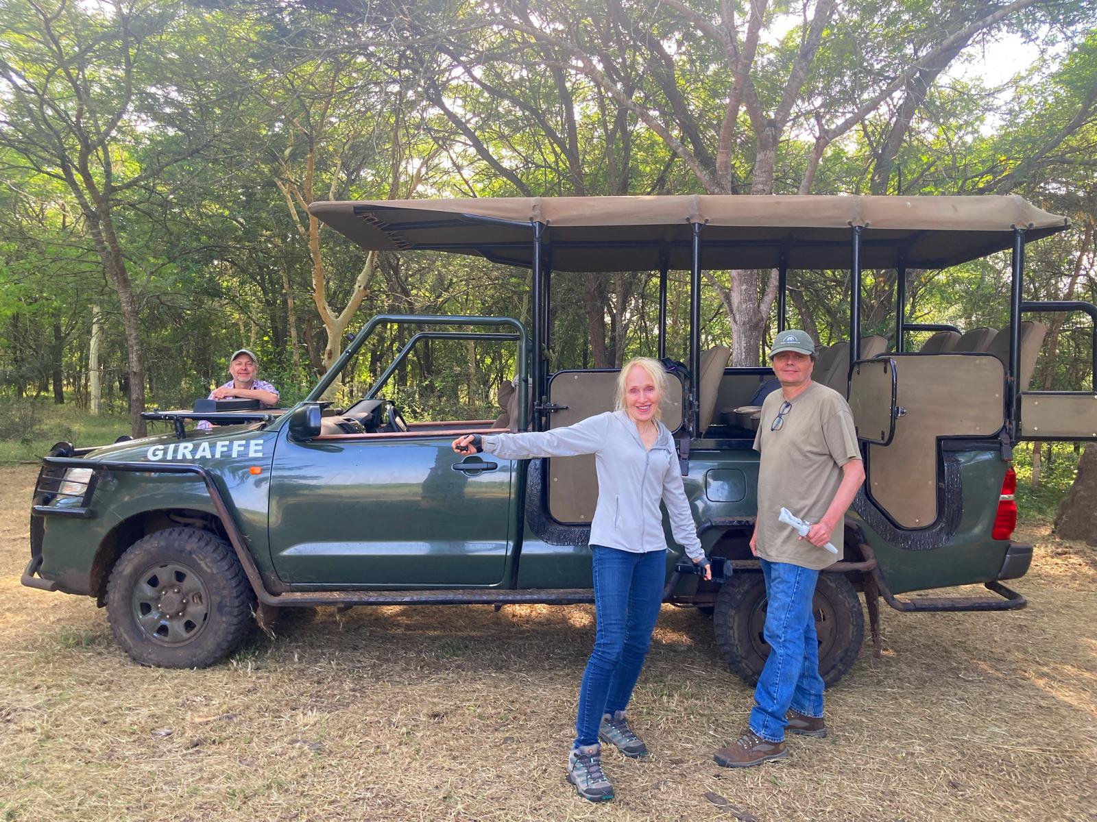 April and Martin taking a break with John Steward, co-founder of Wild Tomorrow (left)