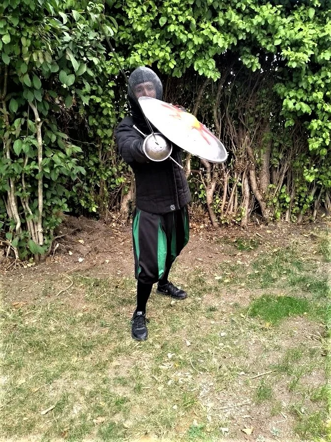 Student matt O Brien demonstrates a thrust with sword and Rodela.jpg