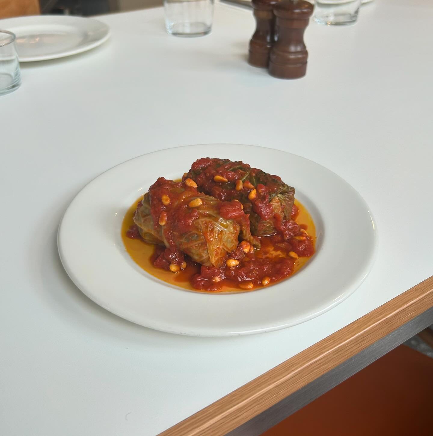 That&rsquo;s cabbage rolls in tomato sauce with lots of herbs and pine kernels and sultanas and that&rsquo;s them on the new long dining tables in the restaurant!