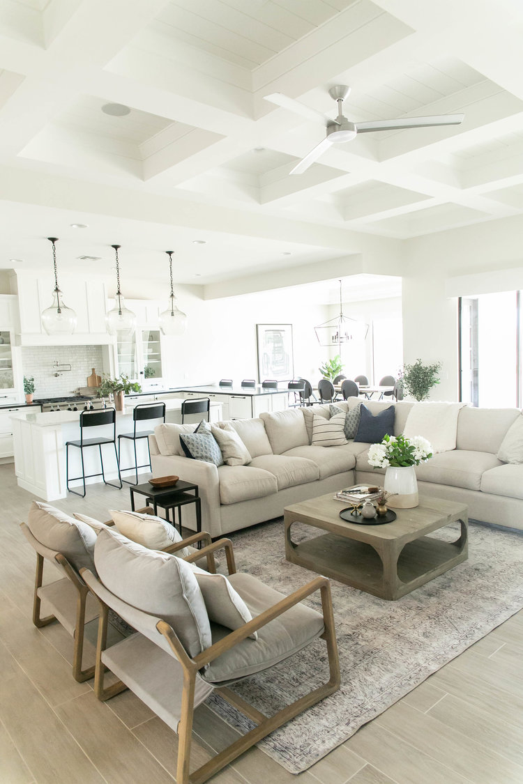 Love this modern living room and great room with an oversized sectional and square wood coffee table - willow and co home