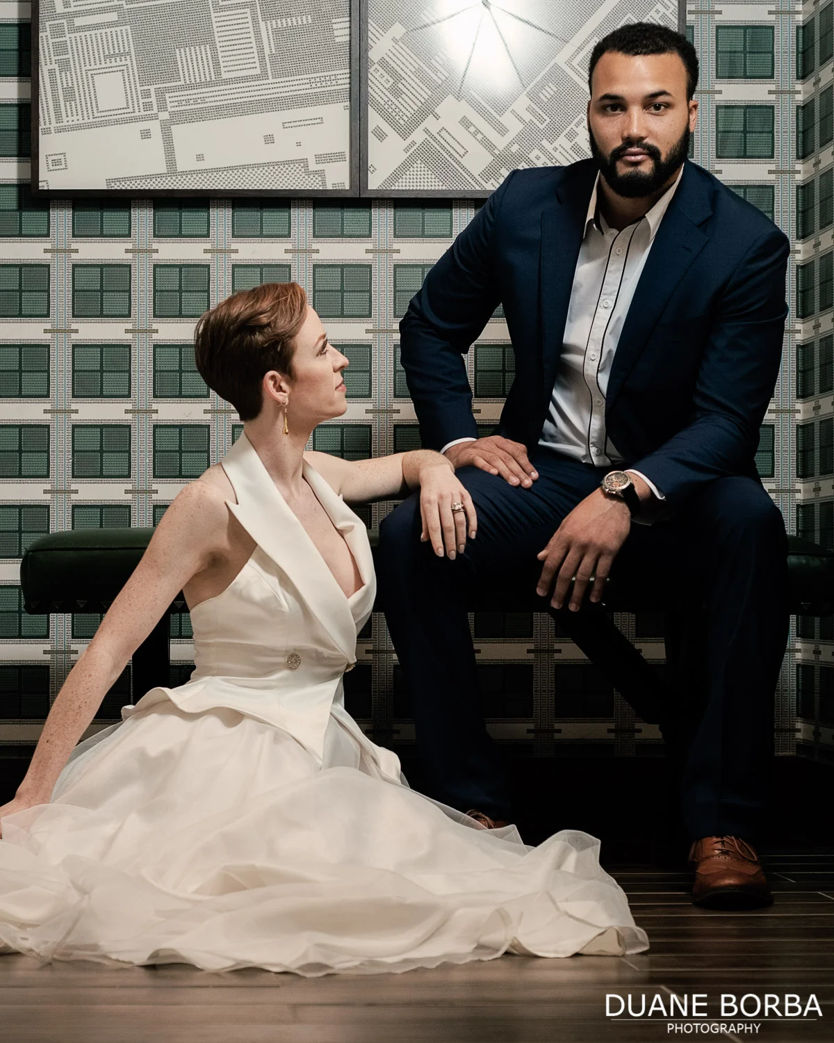 Bride and Groom posing in 505 Nashville's bathroom