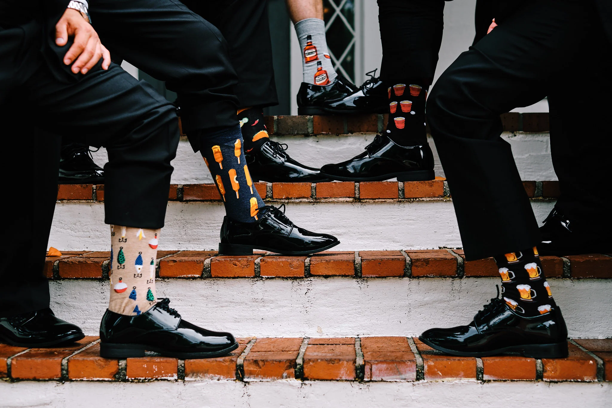 MarcusandGroomsmenwiththeirfunnysocks.jpg