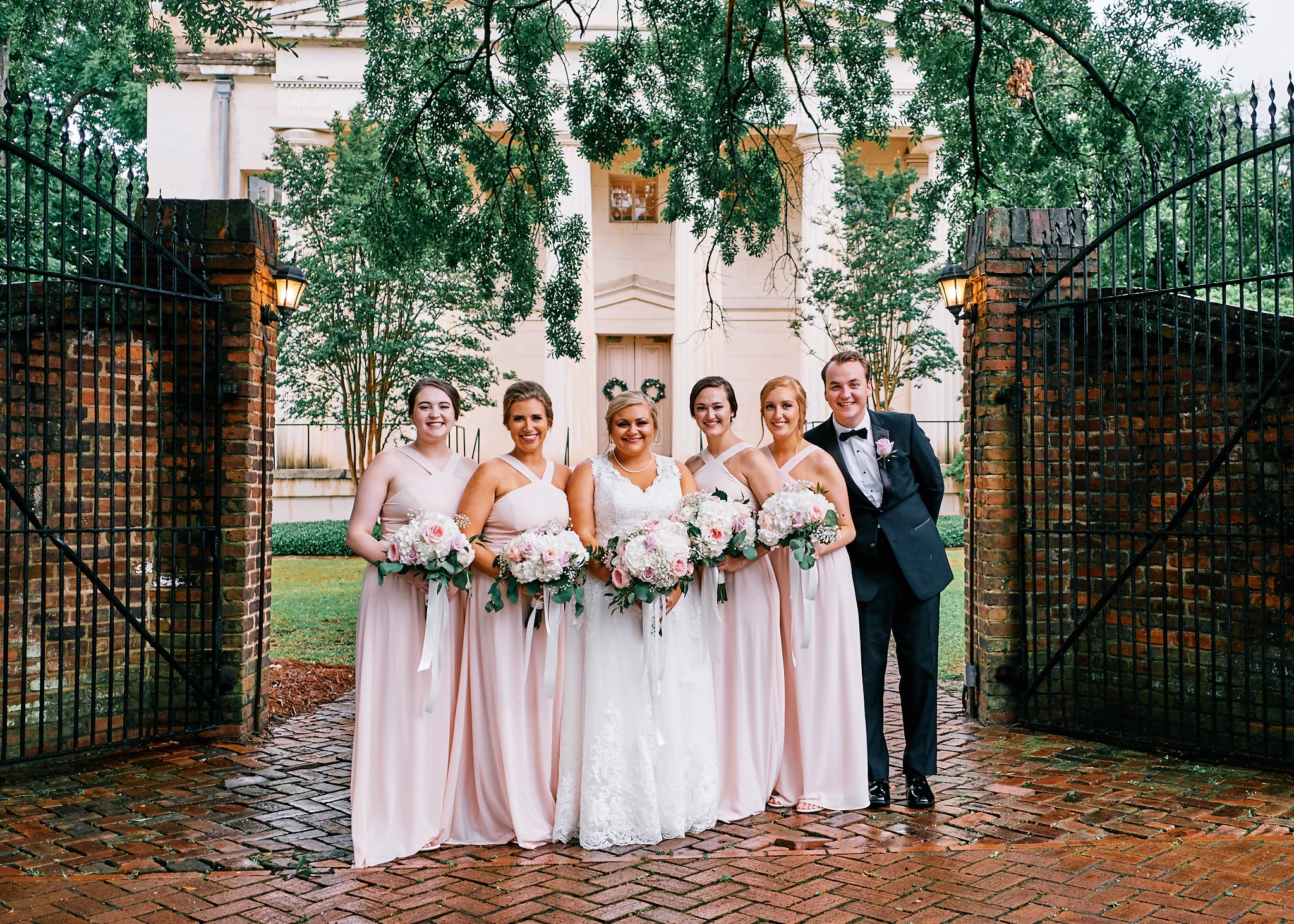 BridalPartyInFrontOfGateEntranceAtOldMedicalCollege.jpg