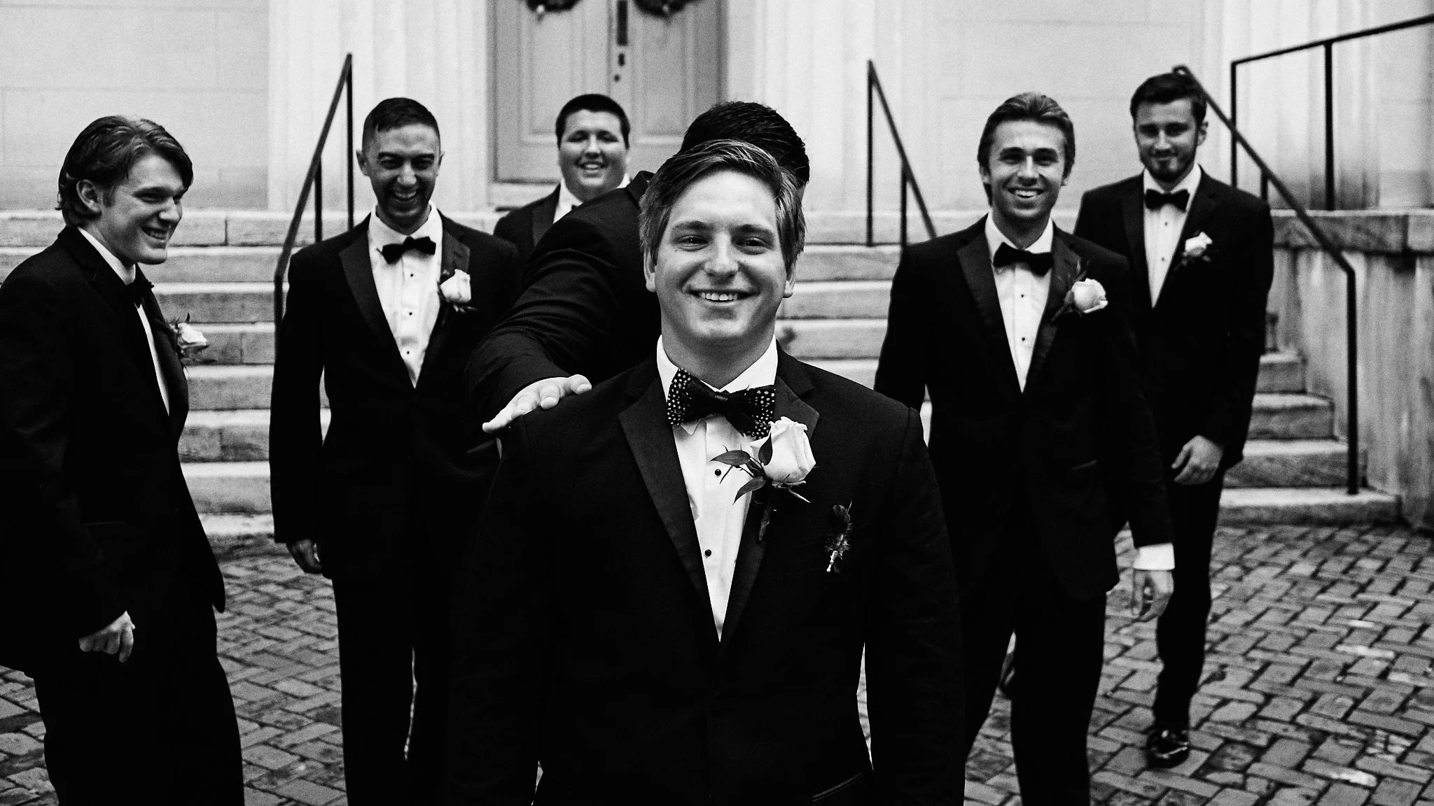 BryanPuttingHandOnMarcusShoulder.jpg