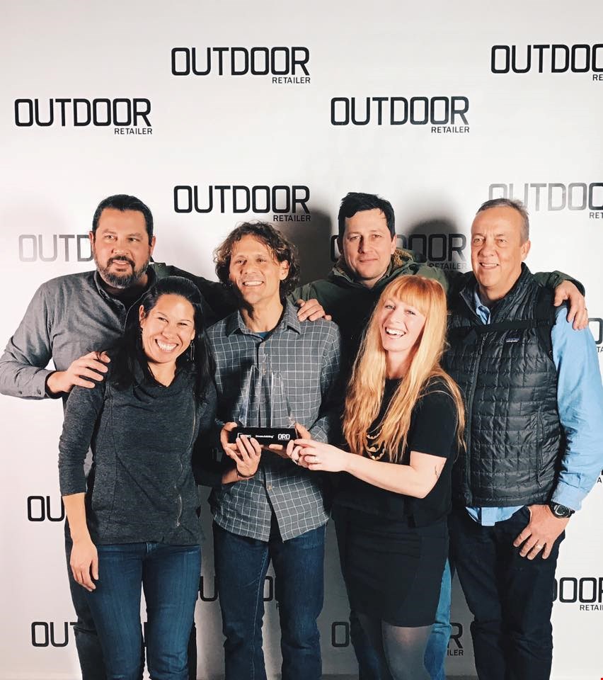 Jeff Samaripa, Linda Balfour, Chris Enlow, Tyler LaMotte, Kirsten Blackburn and Casey Sheahan accepting the 2017 Outdoor Inspiration Award at Outdoor Retailer Winter Market on behalf of KEEN Inc. 