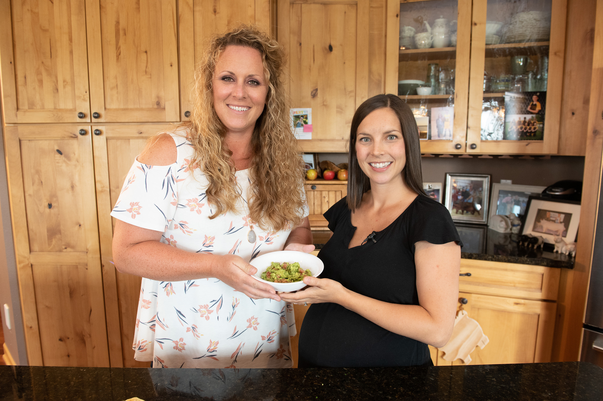 Kristin Porter, the blogger behind Iowa Girl Eats, and host Cristen Clark show off the finished product. Photo credit: Joseph L. Murphy/Iowa Soybean Association