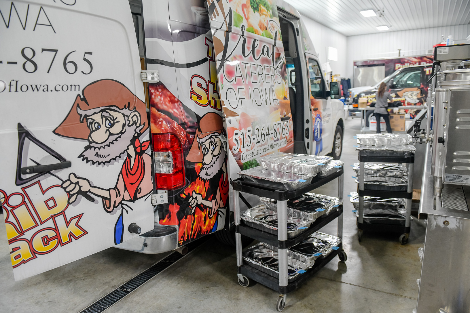 Joni Bell’s team loads a van for an upcoming catering event. Photo credit: Joseph L. Murphy/Iowa Soybean Association