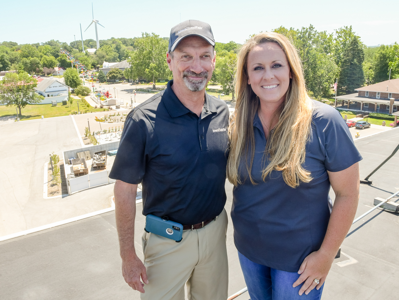 Gary Slater and Cristen Clark stand on top of the Grandstand for a birds-eye view of the fairgrounds. Photo credit: Joseph L. Murphy/Iowa Soybean Association