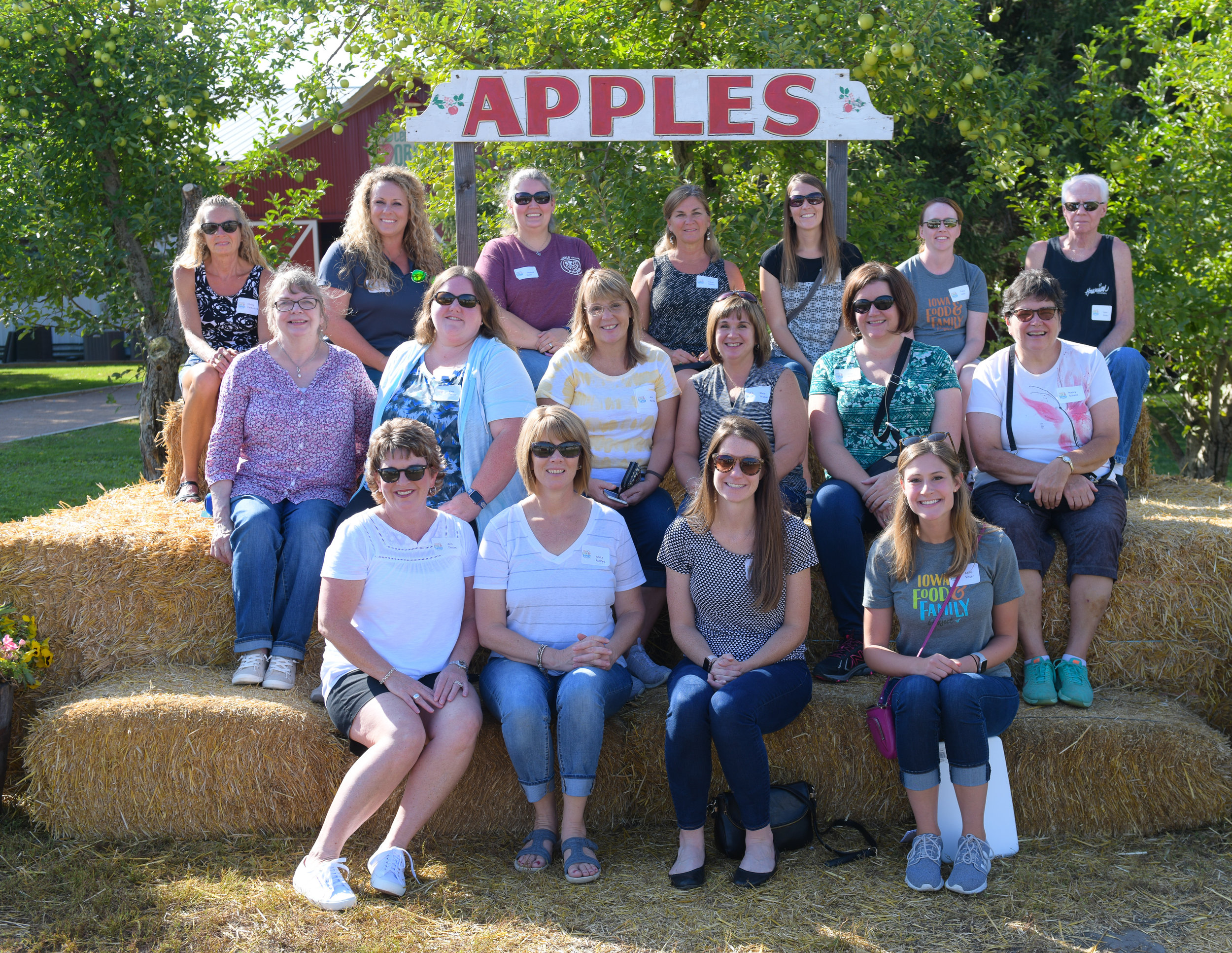 Iowa FFP Champions and their guests stop for a photo outside of Center Grove Orchard in Cambridge. Photo credit: Joseph L. Murphy/Iowa Soybean Association