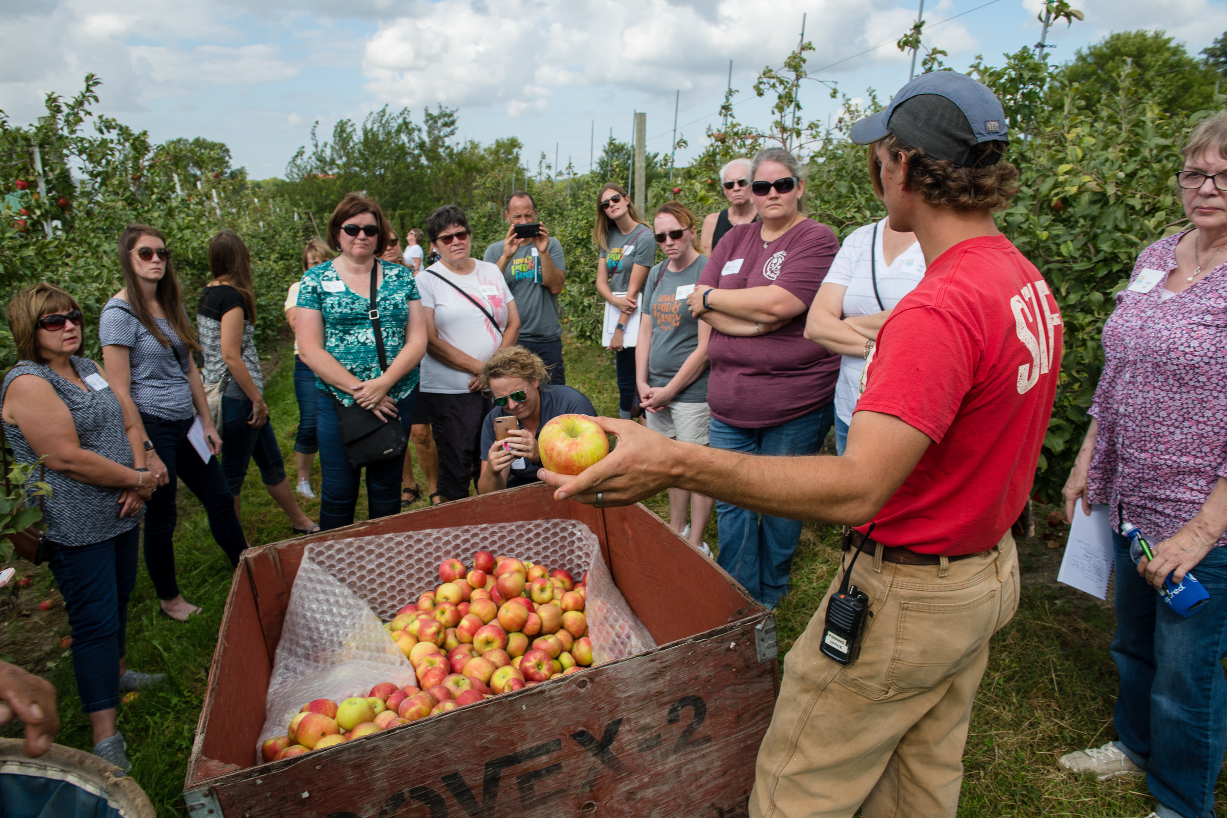 Food U participants spoke with the Center Grove Orchard horticulture supervisor, Brian Shilling. Photo credit: Joseph L. Murphy/Iowa Soybean Association