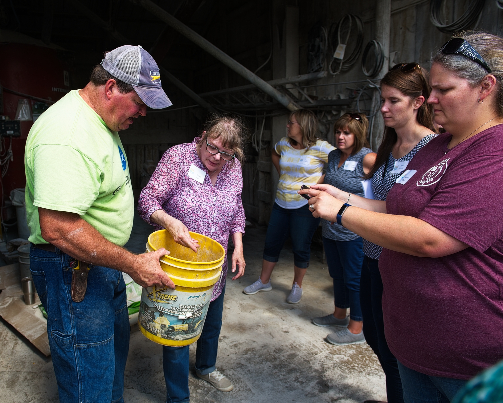 Dave Struthers explains how the soybeans and corn grown on his farm are used to feed his hogs. Photo credit: Joseph L. Murphy/Iowa Soybean Association