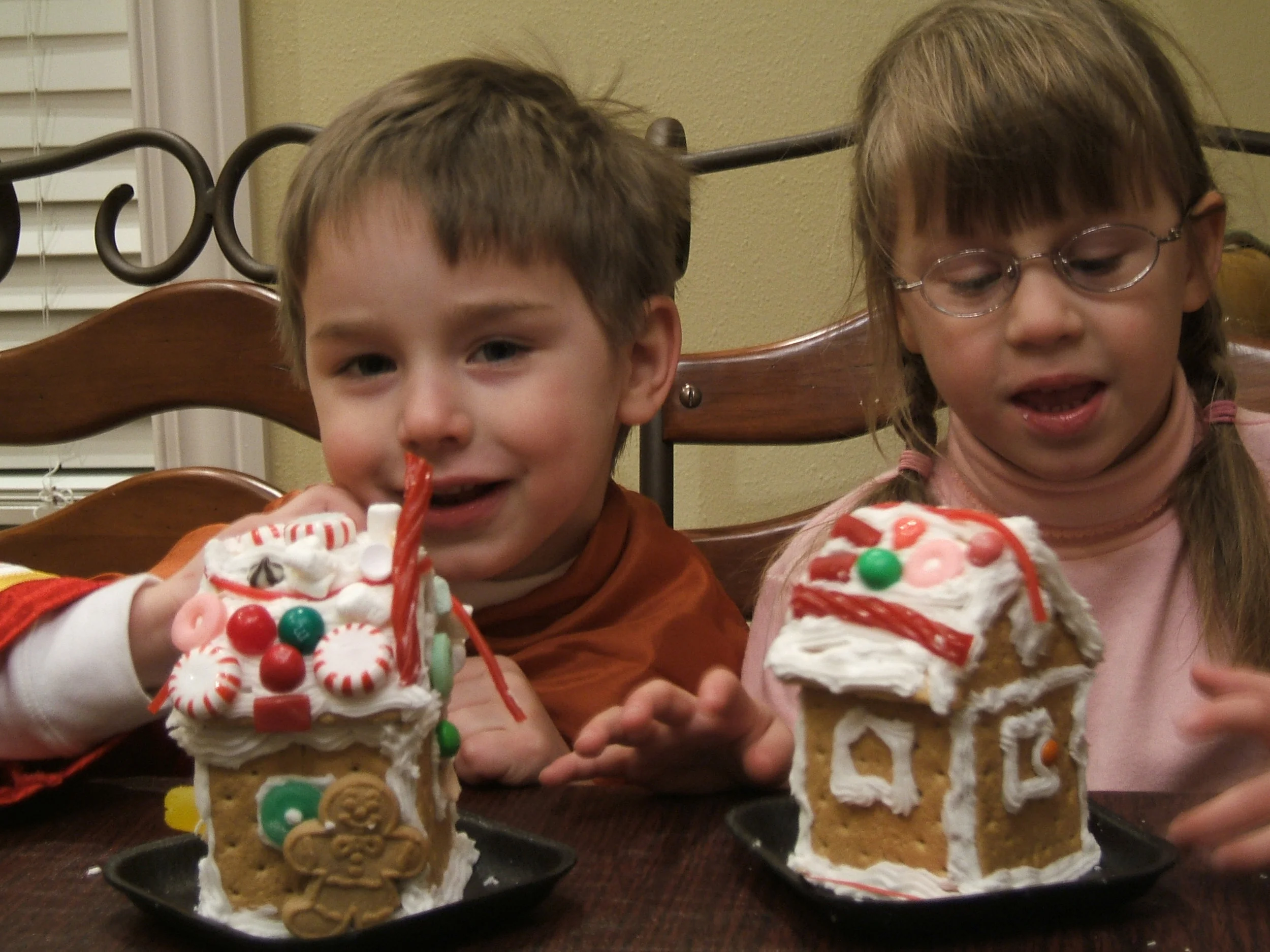 An old family photo of the Latham children with their gingerbread house creations. Photo credit: Shannon Latham