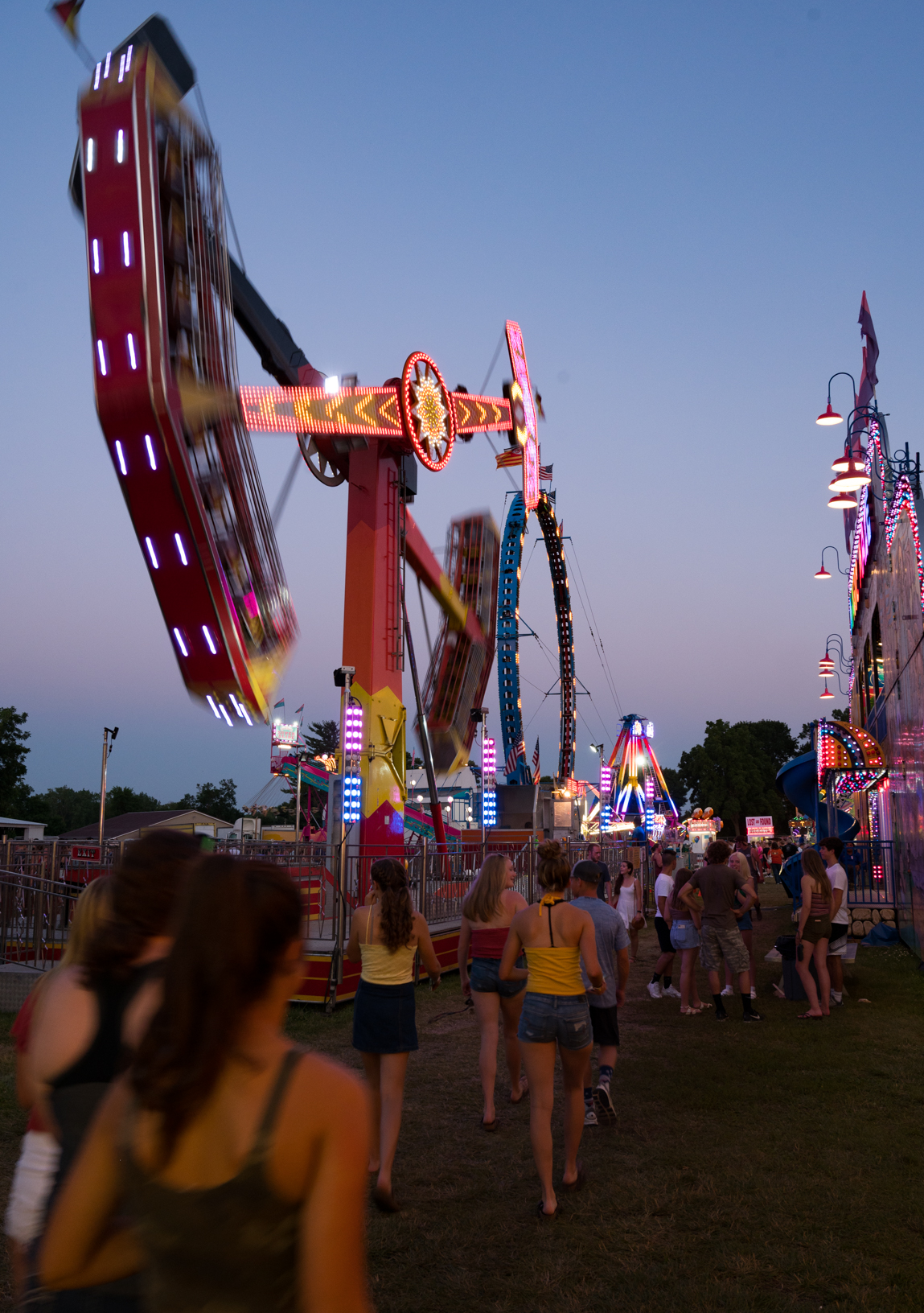 Midway rides light-up the night sky as teenagers enjoy the Jones County Fair in Monticello. Photo credit: Joseph L. Murphy/Iowa Soybean Association
