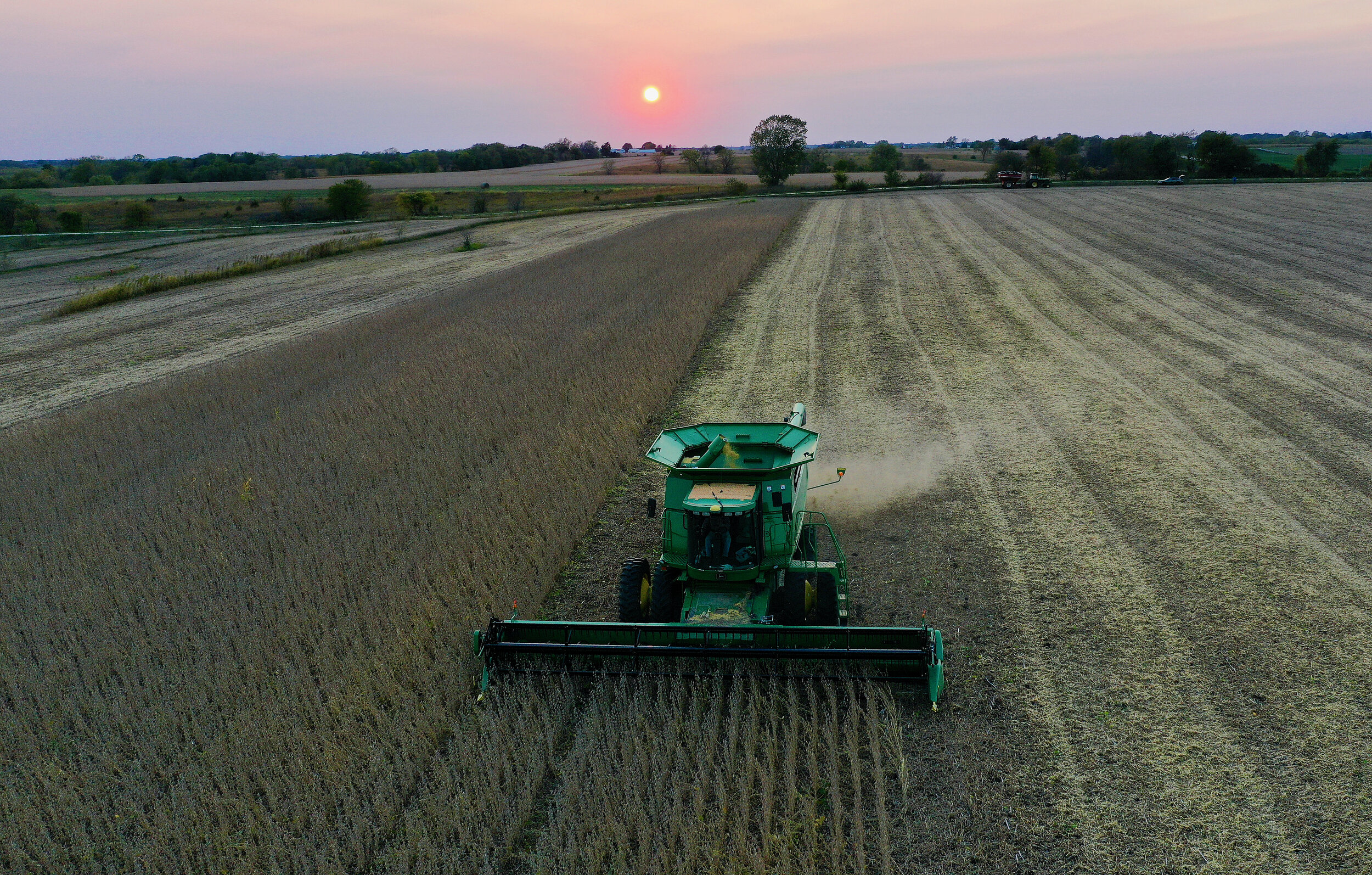  Randy Miller pilots his combine through a soybean field near his home in Lacona. 