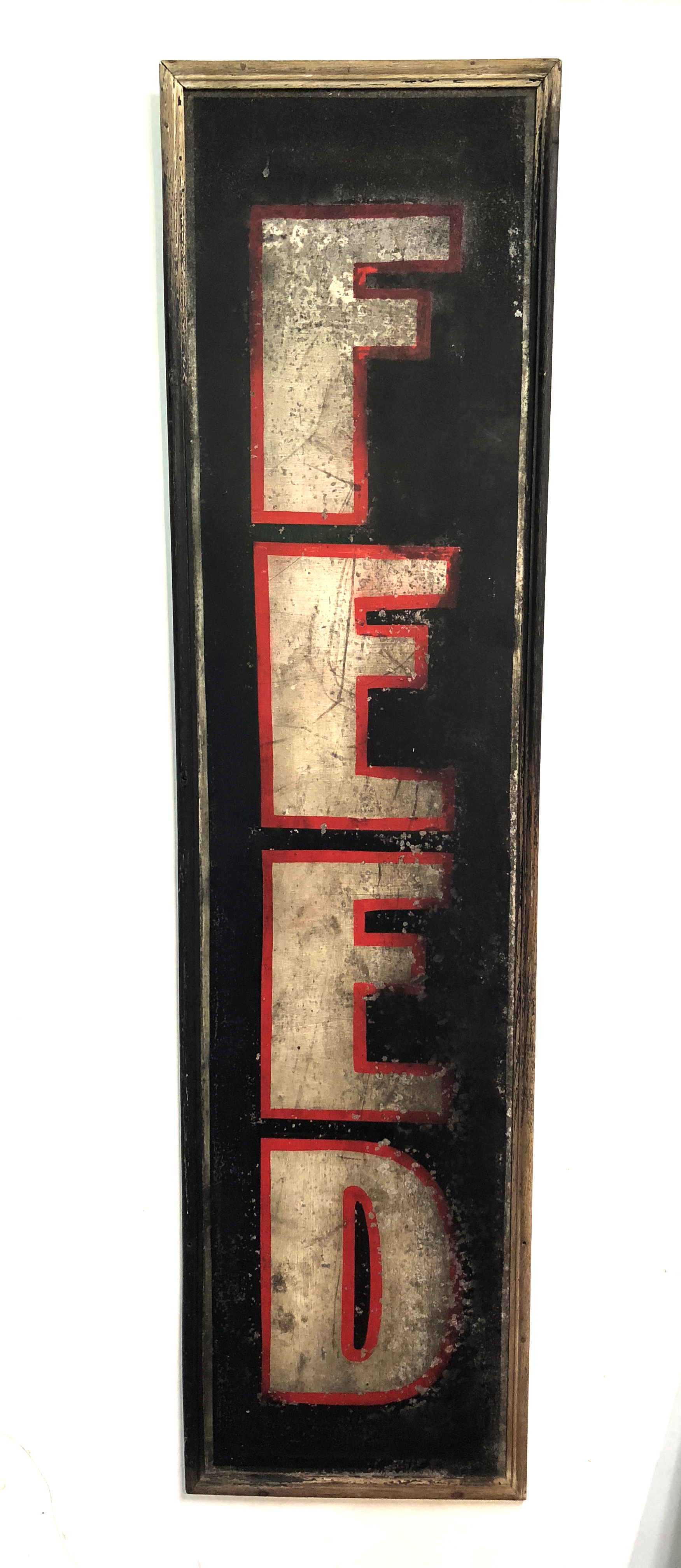   Tin with wooden frame, 60.5" h x 15.25" w, Ashland, Ohio, early 20th century.  
