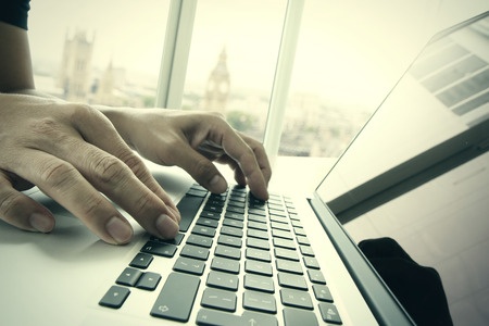 July 12 41471381_S_computer_typing_working_online.jpg