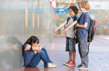 35508654_S-Bullyin_Children_School_Laughing_making fun_pointing_Girl_boys.jpg