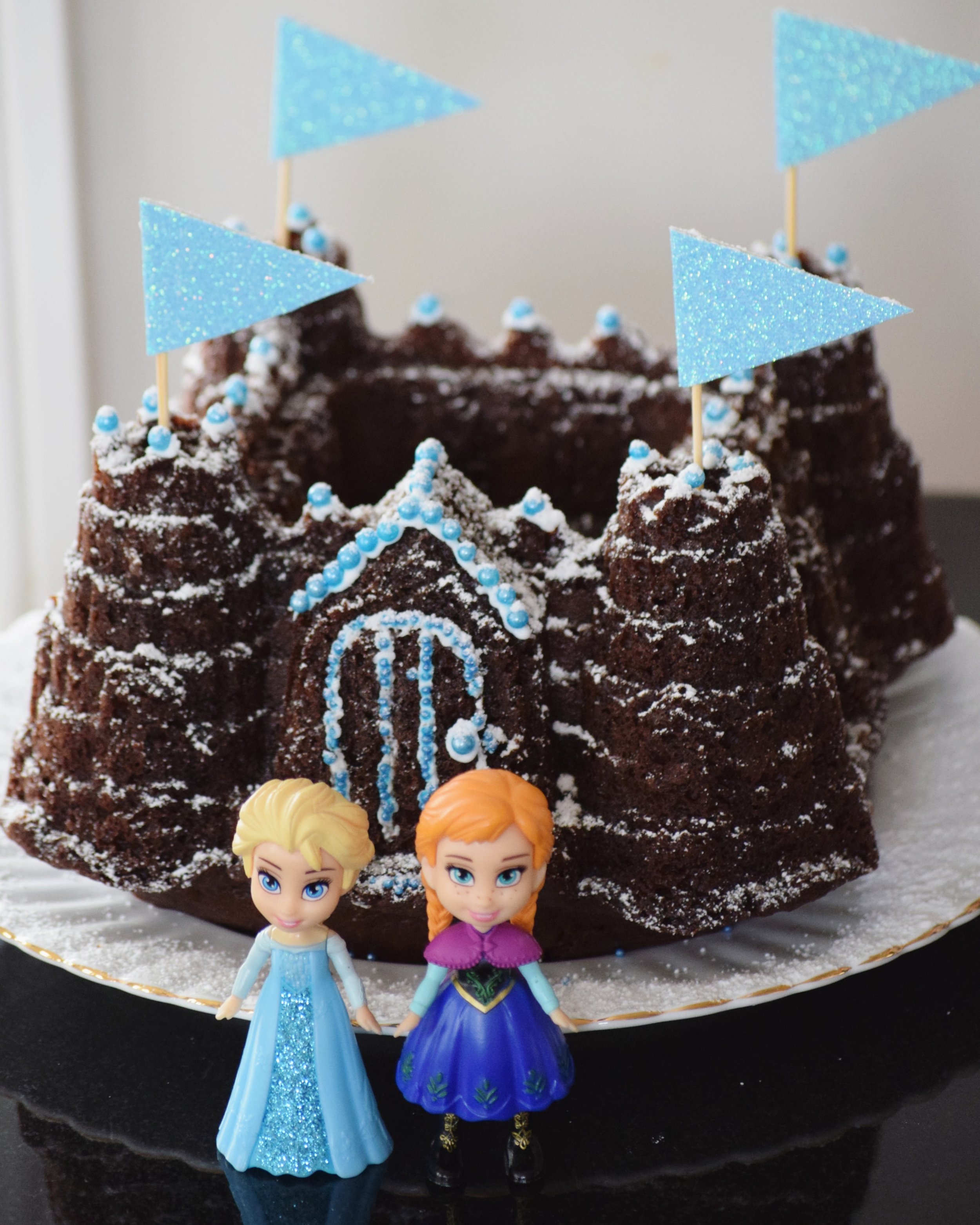 frozen birthday party cake decorating.jpg