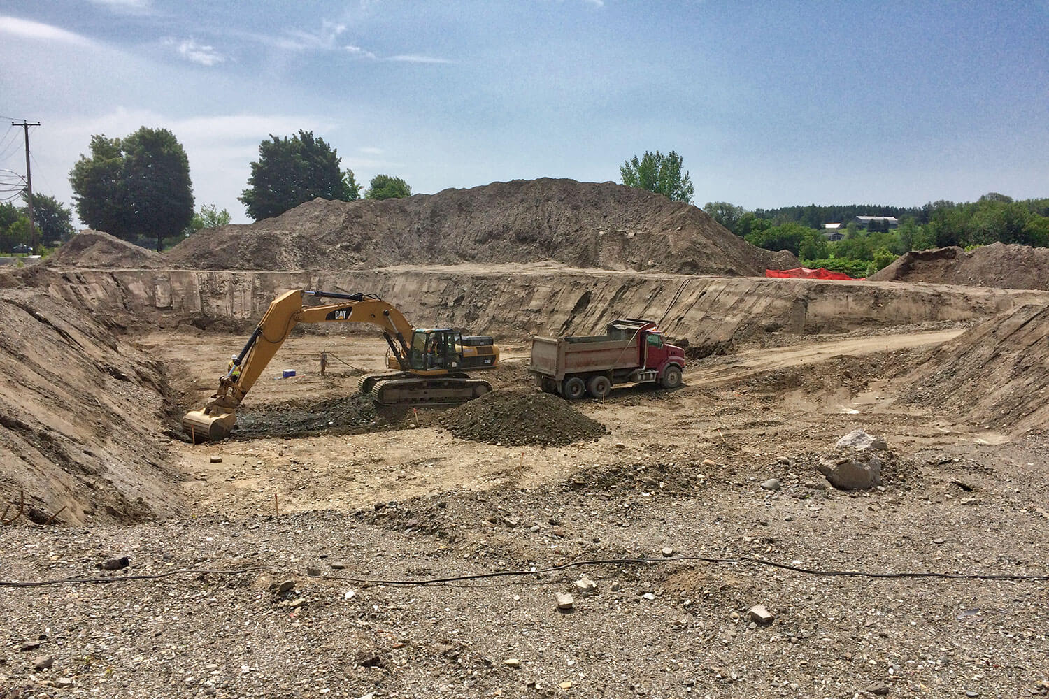 Environmental soil remediation by excavation of industrial site in Sainte-Marie.