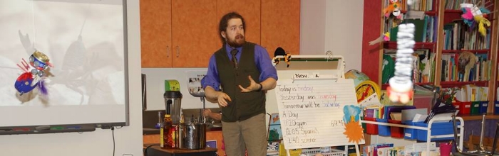 When children are young enough, anything strange and unfamiliar will hold their attention. Here I am doing outreach with some first graders.