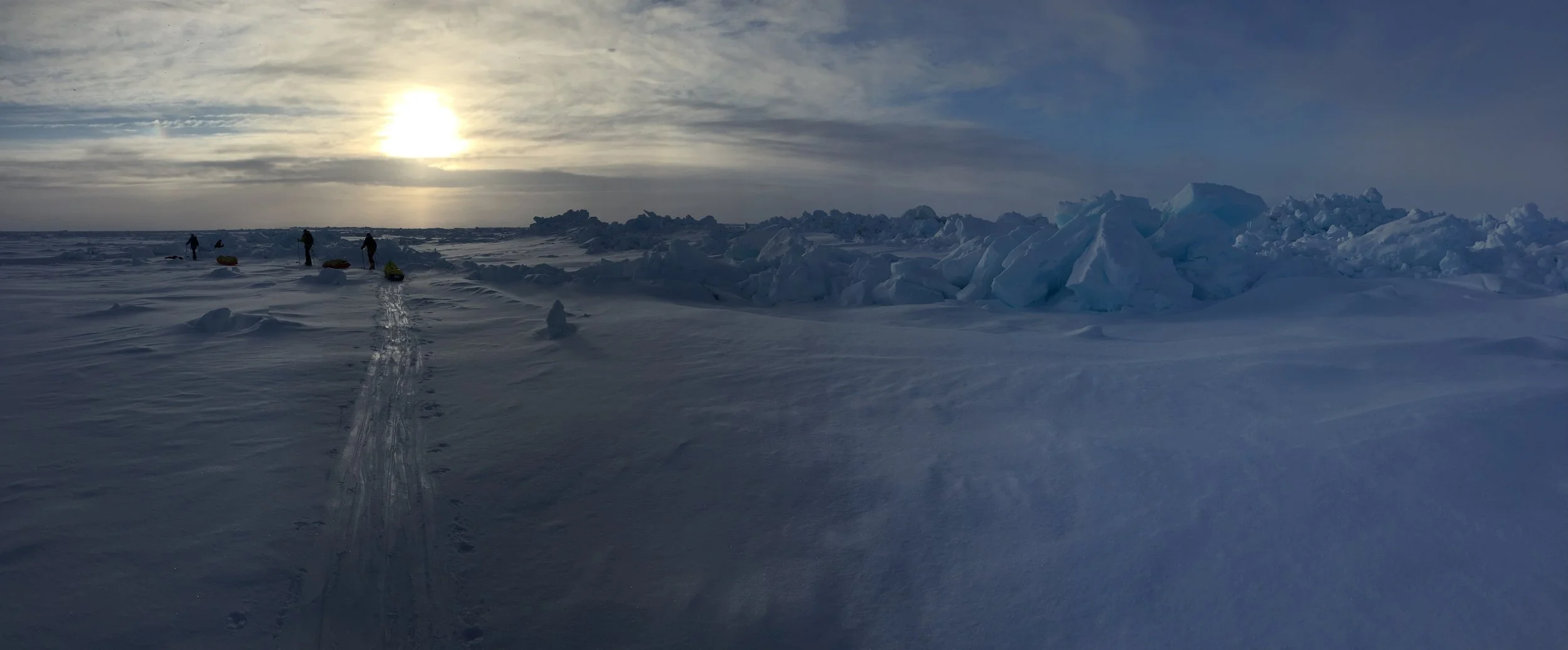 Skiing Through the Early Morning Haze of the Arctic Summer