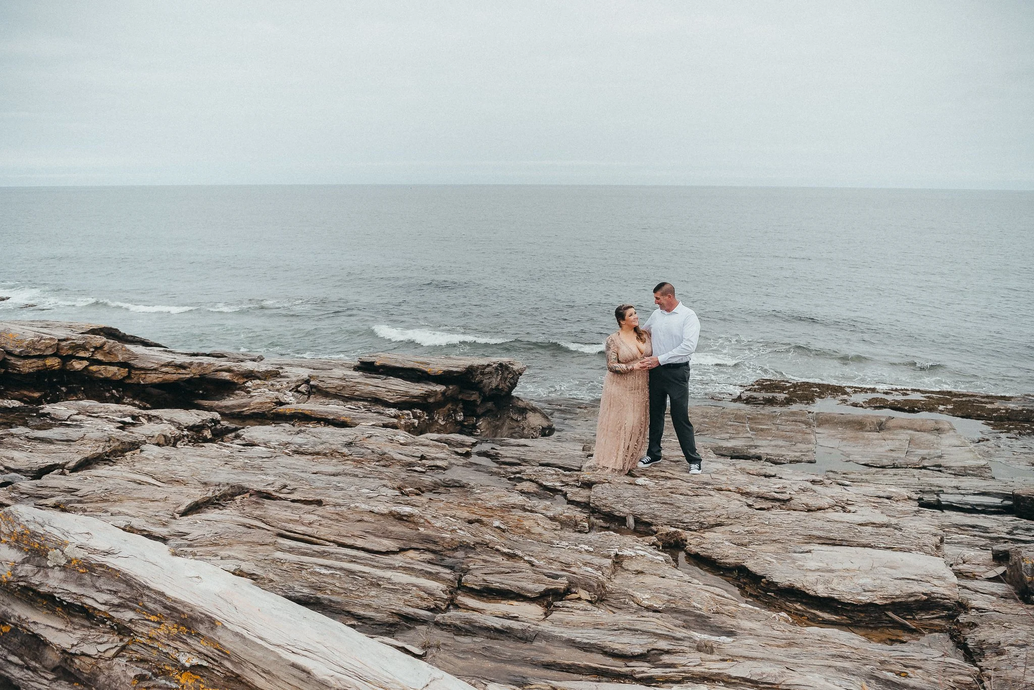Acadia National Park elopement photographed by a Maine elopement photographer with expertise in coastal weddings, national park permits, and intimate ceremonies
Downeast Maine elopement photography capturing a couple getting married along the rocky c