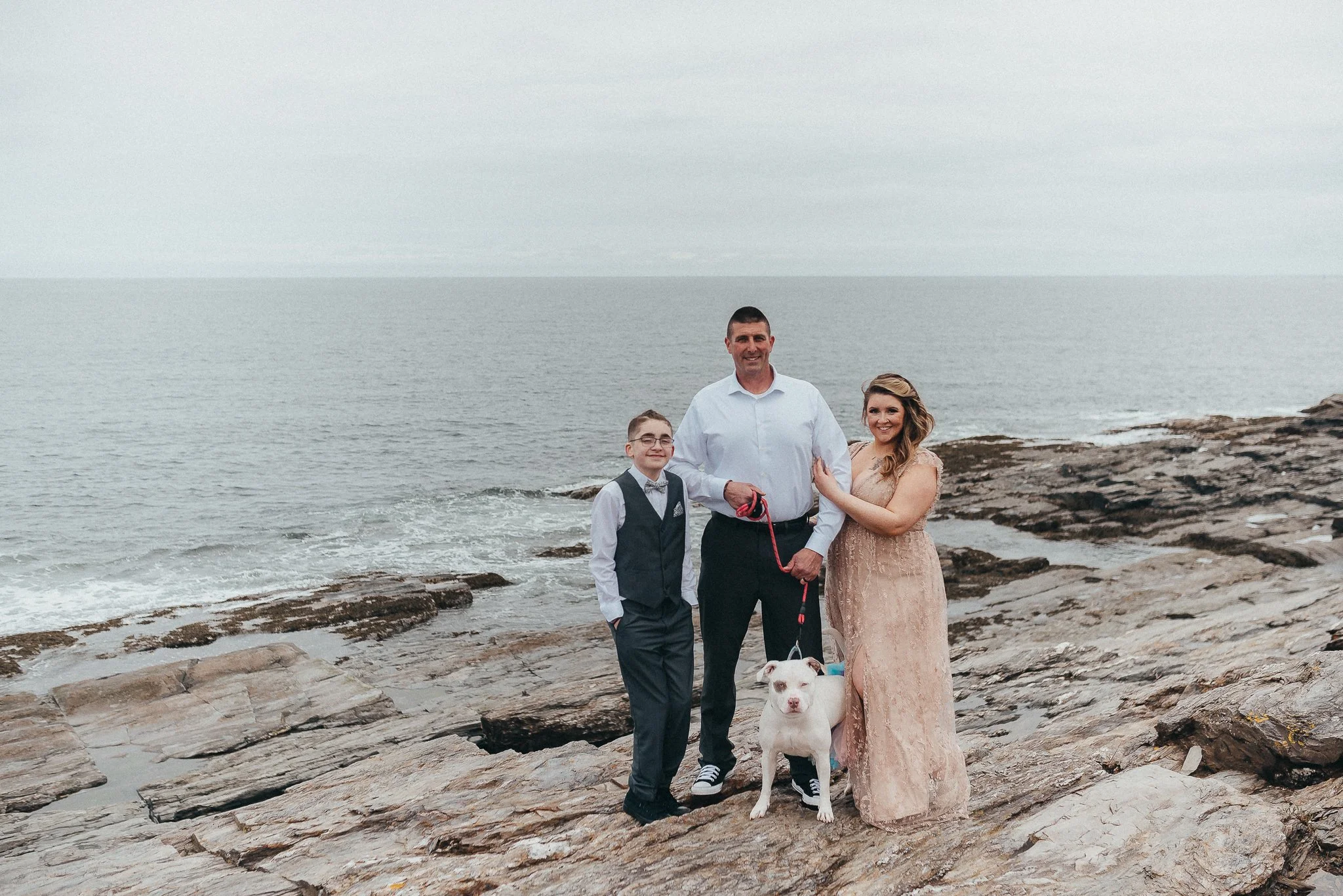 Acadia National Park elopement photographed by a Maine elopement photographer with expertise in coastal weddings, national park permits, and intimate ceremonies
Downeast Maine elopement photography capturing a couple getting married along the rocky c