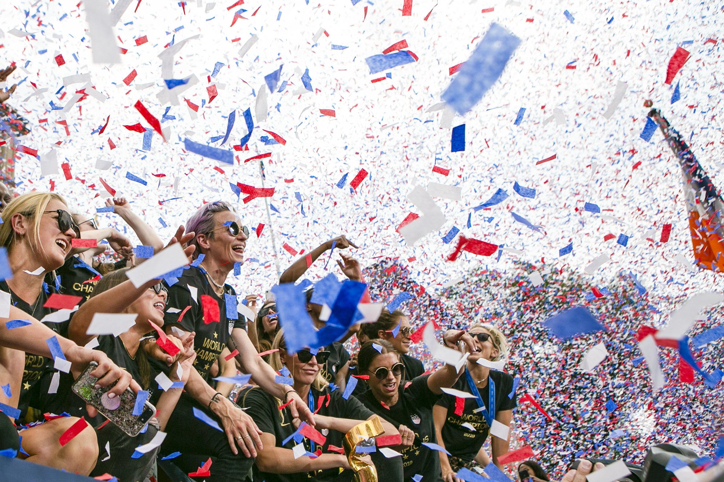  The U.S. Women's National Soccer team celebrates as confetti flies outside of New York City Hall at a ceremony following the team's parade down the Canyon of Heroes in lower Manhattan for their World Cup win on Wednesday, July 10, 2019 