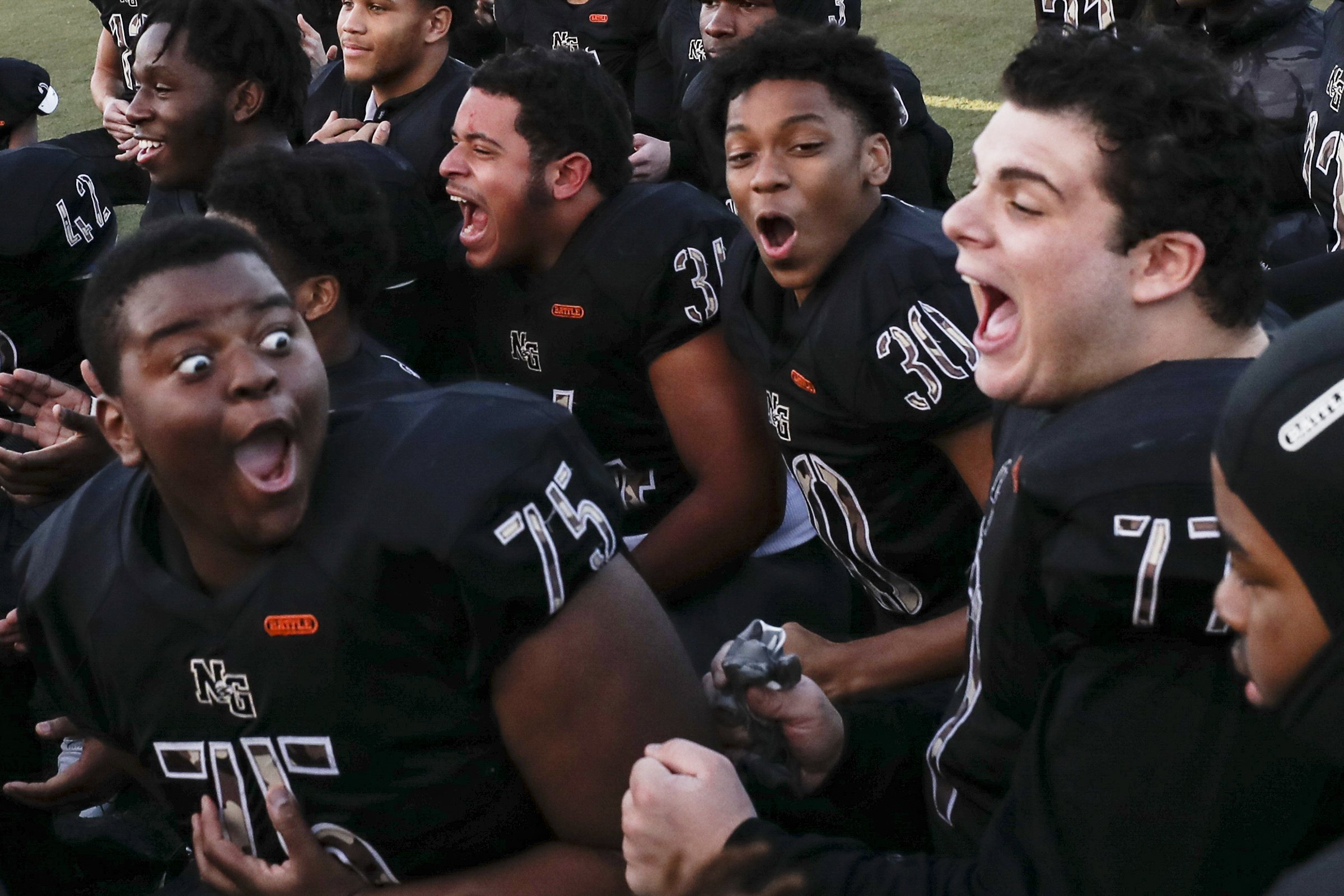  Neumann-Goretti players react after being told by their coach that Monday’s practice will be at the Eagles’ facility following their PIAA semifinal win over Wyomissing in Philadelphia on Dec. 3, 2022.  The win earned them a trip to the state finals.