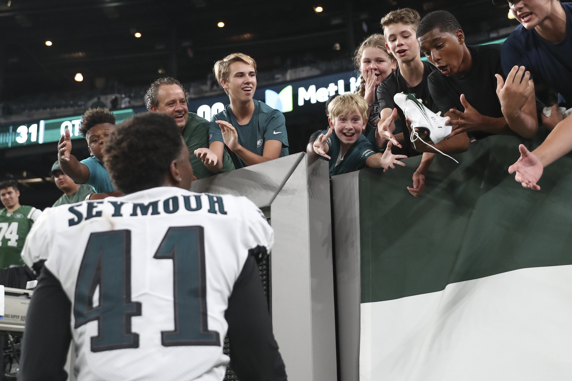  Philadelphia Eagles cornerback Kevon Seymour (41) throws his cleats to fans at the end of a preseason game against the New York Jets at MetLife Stadium in East Rutherford, NJ on Aug. 27, 2021. 