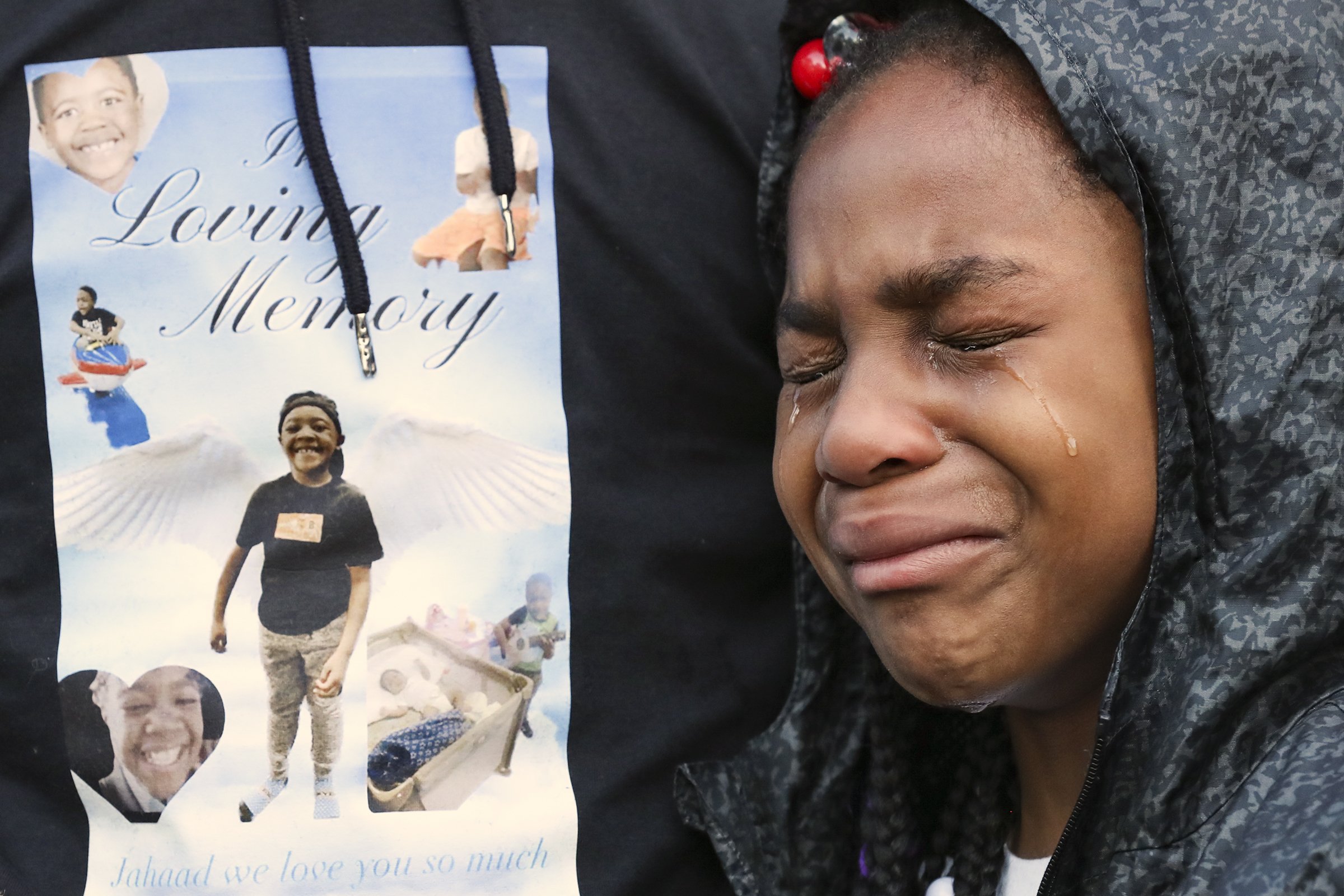  Sarah Butler, stepsister of Jahaad Atkinson, cries before the start of a vigil for Atkinson and Ahyir Womack at Martin Luther King Park in Chester, Pa. on May 5, 2023. The boys, who were 9 and 12 years-old, were killed after being struck by an Amtra