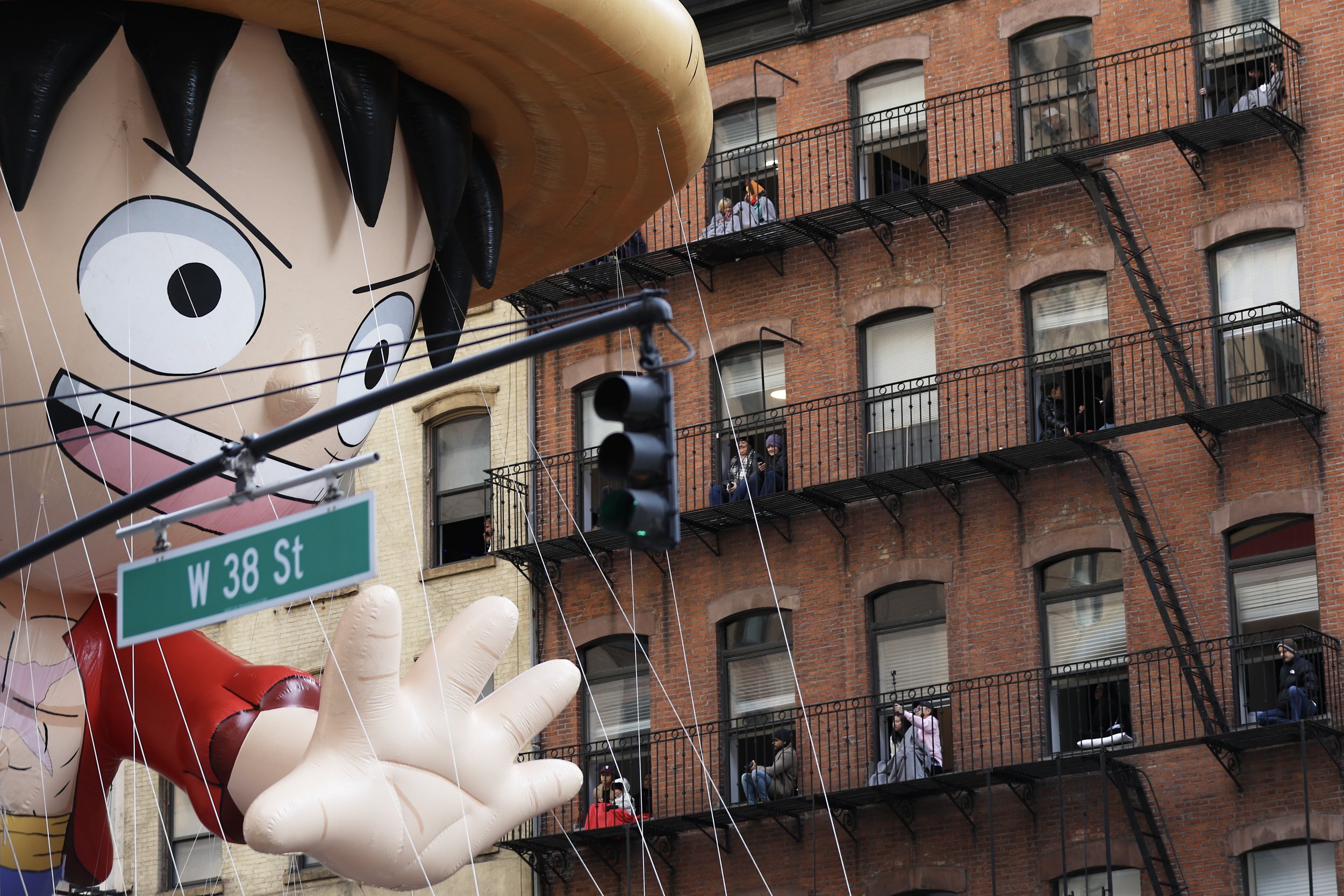  The Monkey D. Luffy balloon makes its way down Sixth Avenue during the Macy’s Thanksgiving Day Parade, Thursday, Nov. 27, 2025, in New York. (AP Photo/Heather Khalifa) 