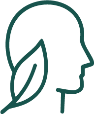 Profil d'une tête de femme avec une feuille ou une branche à l'arrière-plan