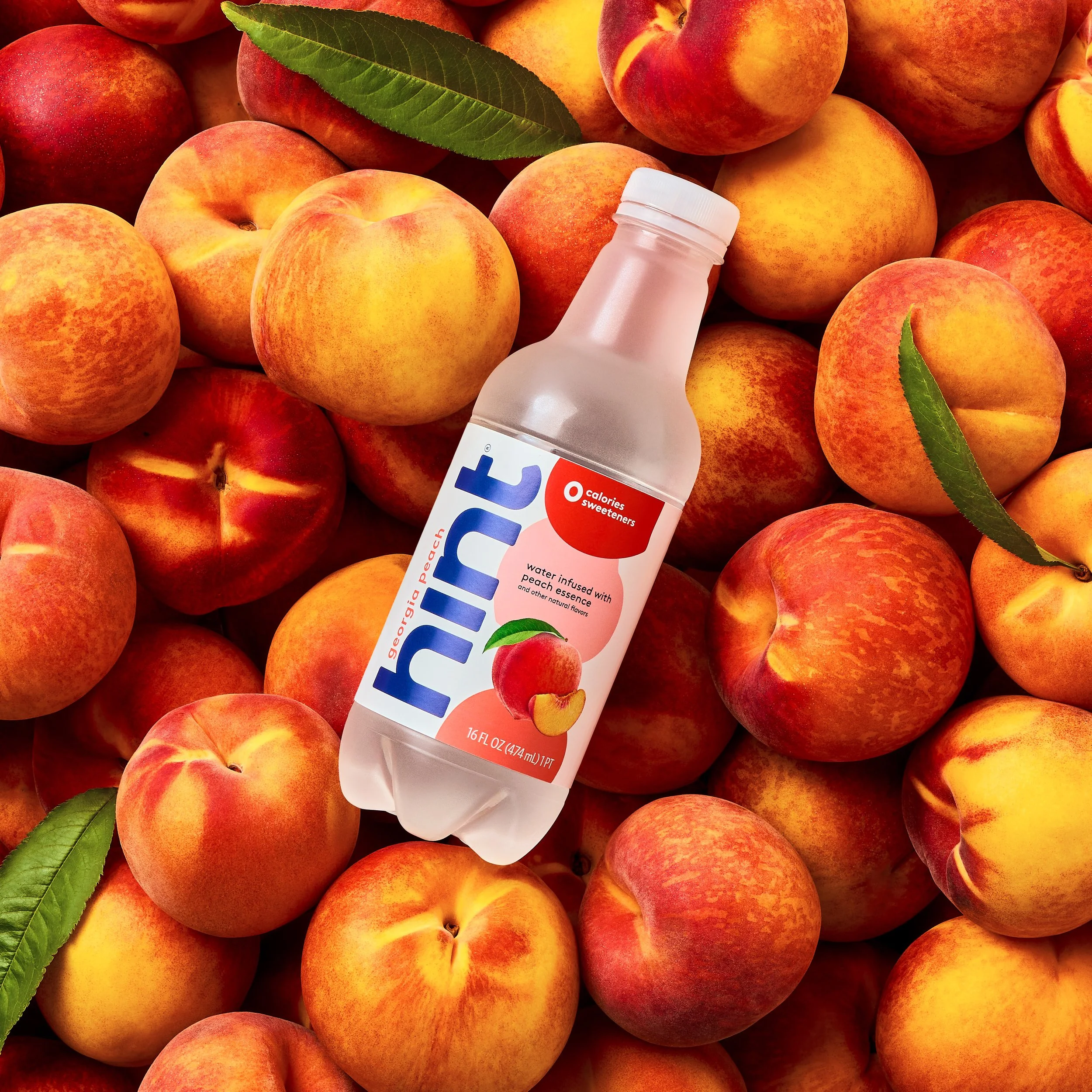 Hint 16oz 12pk-Amazon-Georgia Peach-Lifestyle - 1.jpg
