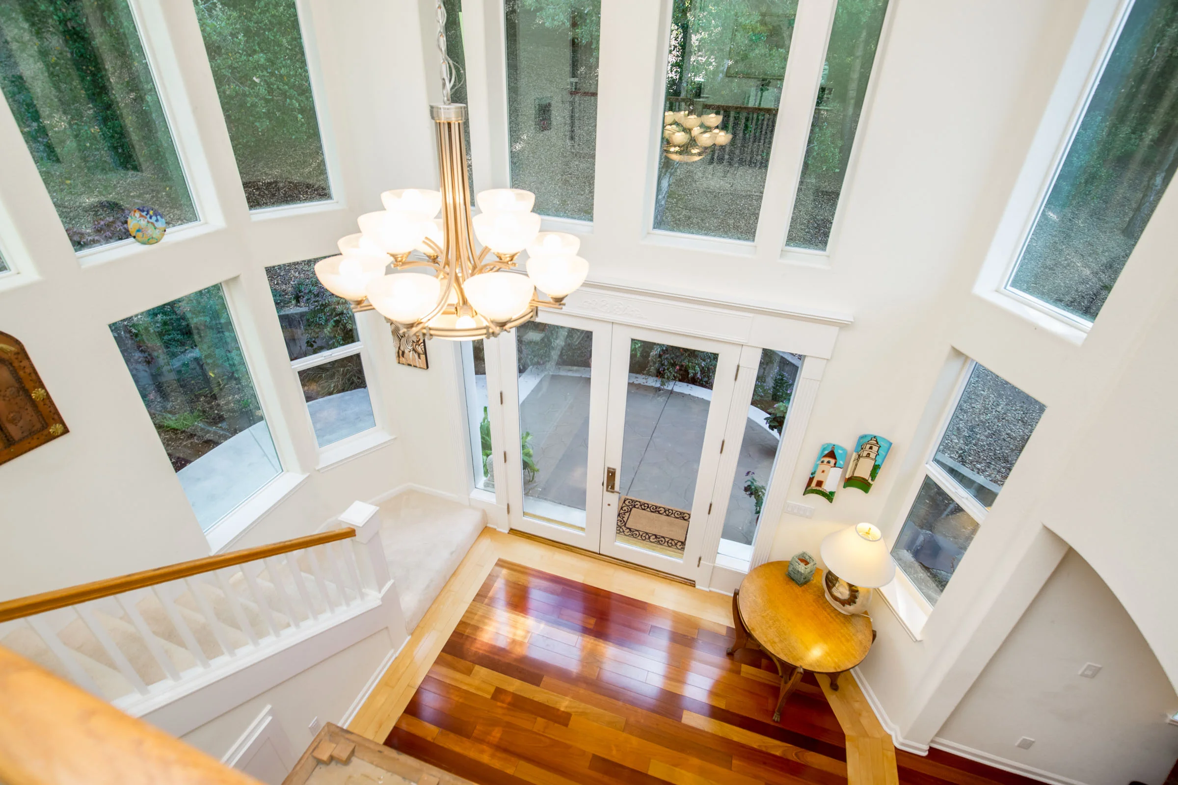 260 Jaunell Road, Aptos - Peaceful, turnkey home on a private road in a quiet corner of Aptos. Just a stone's throw from HWY1, Aptos Village, Seascape Golf Course, and endless walking beaches! Natural light illuminates all the living spaces while the high ceilings and expansive windows showcase the home's natural setting among oak trees. Presented by Sam Bird-Robinson, Santa Cruz Realtor