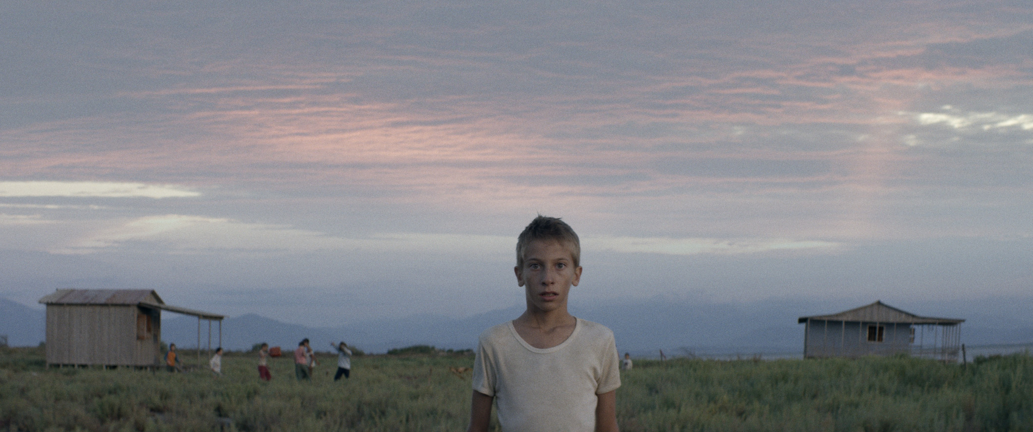 Limbo Director/Writer: Konstantina Kotzamani // Producers: Maria Drandaki, Ron Dyens // Greece The leopard shall lie down the goat, the wolves shall live with the lambs and the young boy will lead them. 12+1 kids and the carcass of a whale washed ashore.