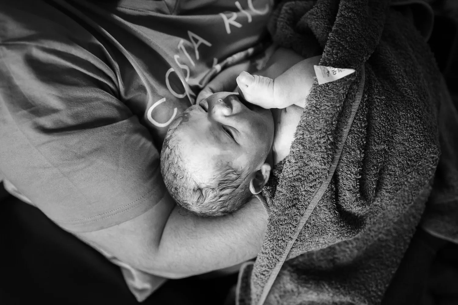 Newborn details during golden hours after birth at home location in Victoria Australia.