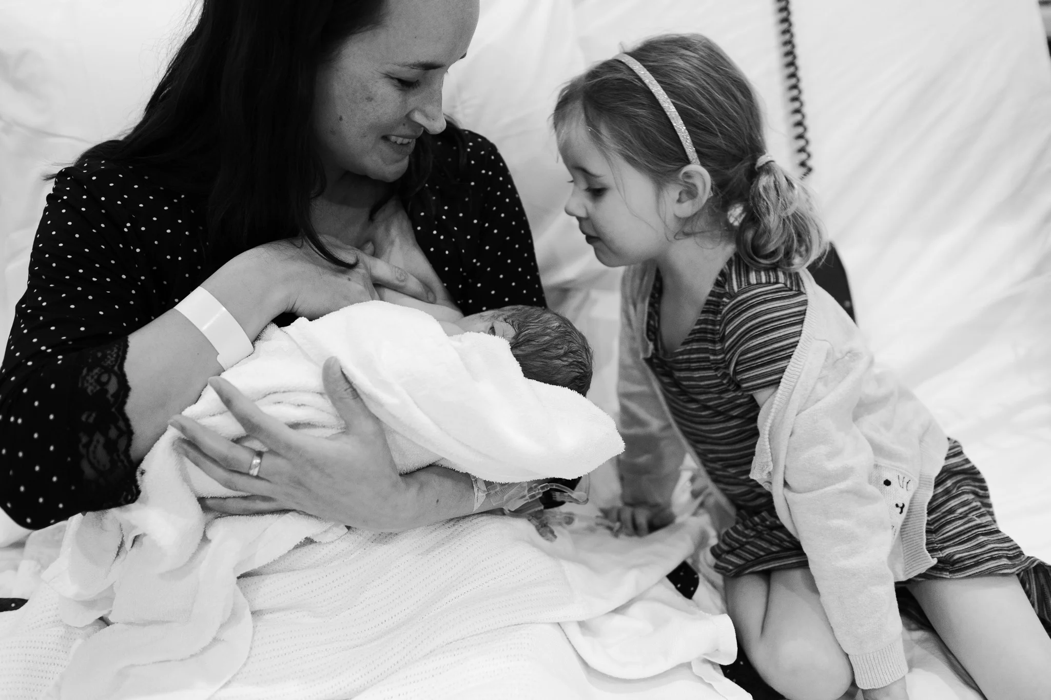 Skin to skin and first feeds after birth witnessed by big sister at Mitcham Private Hospital.