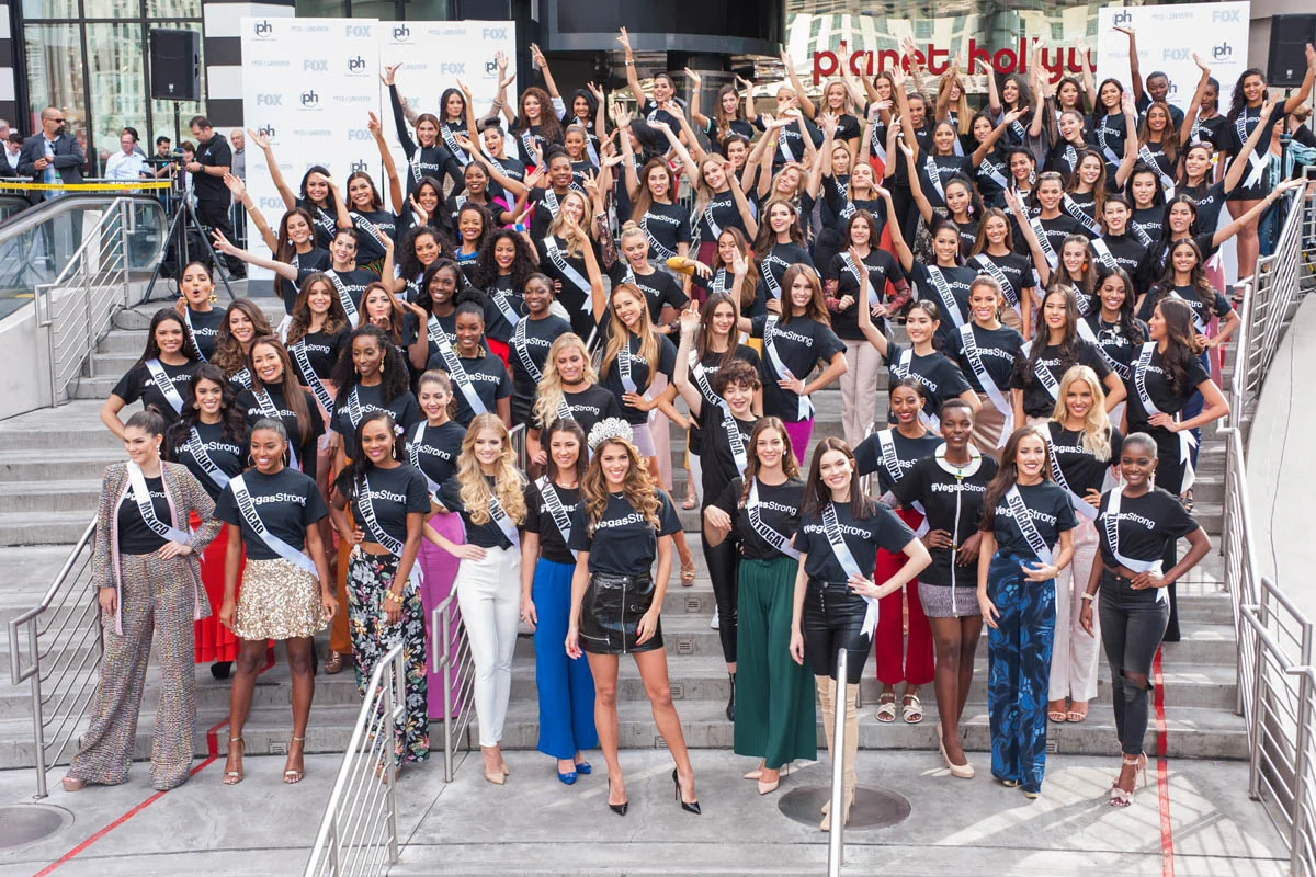 Iris Mittenaere poses with the 92 contestants of the 66th Miss Universe Pageant at Miracle Mile Shops in Las Vegas on Thursday, November 16th, 2017