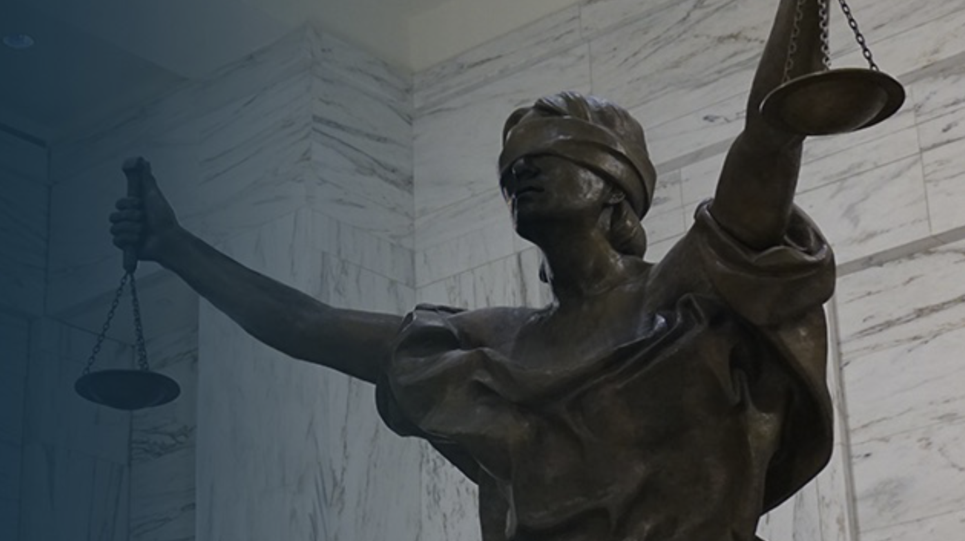 a statue of the blind goddess of justice, Southern District of NY