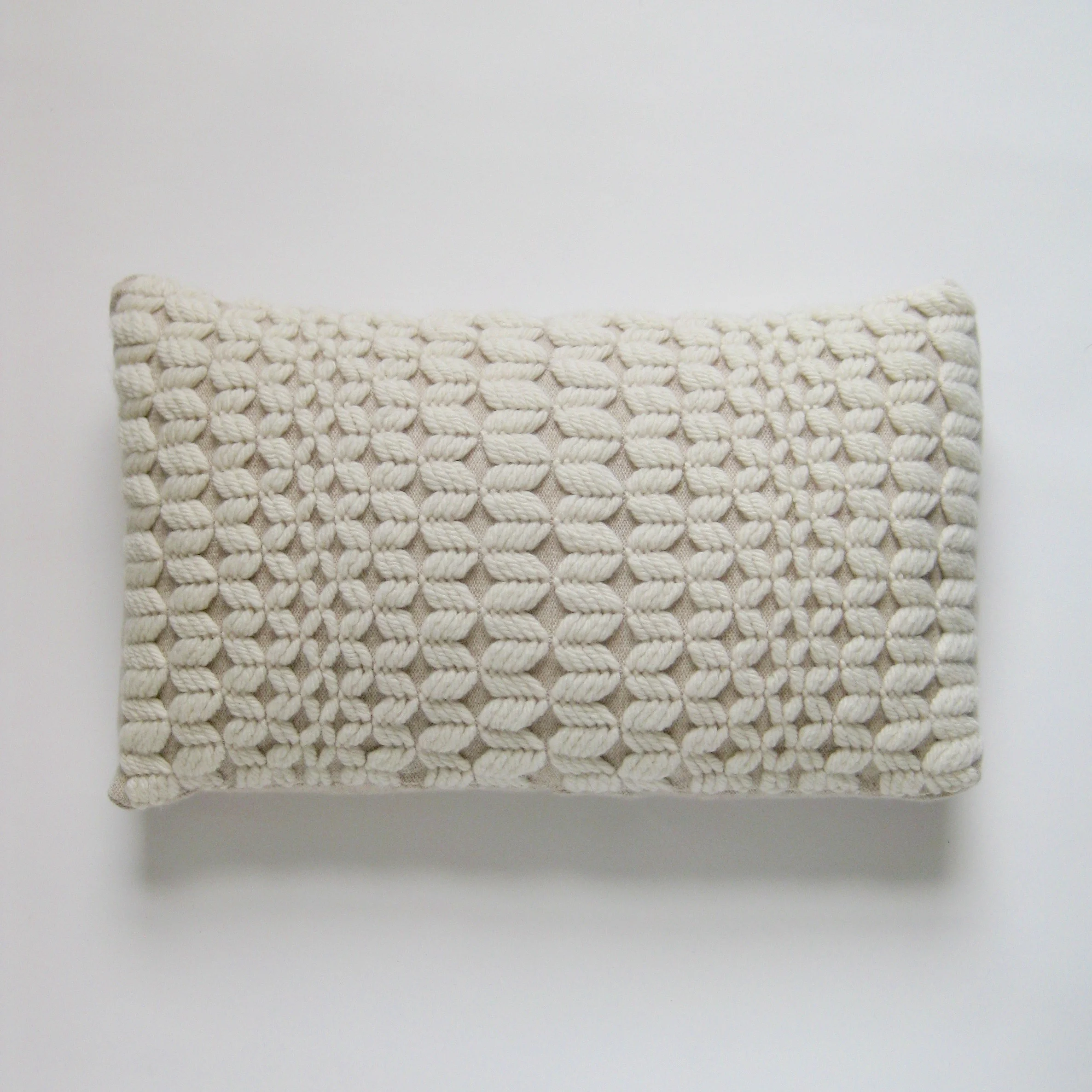 wave-rectangle-cushion-ecru