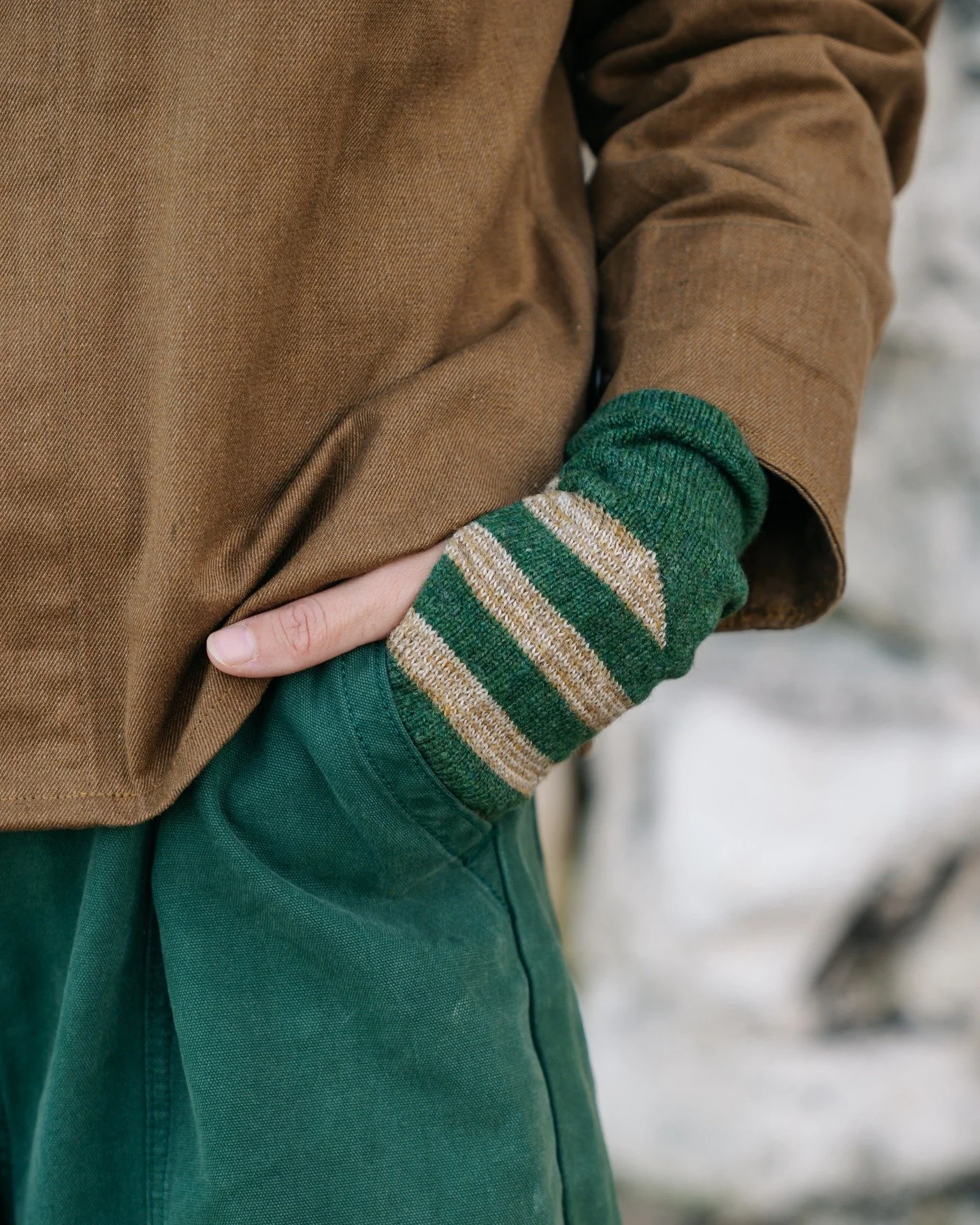 Perfect for unpredictable Spring! 

Shown here are the Stripe Fingerless Gloves crafted on my vintage knitting machine using 100% natural and sustainable lambswool in subtle shades of seaweed, sage, faded olive and serpentine green, inspired by the c