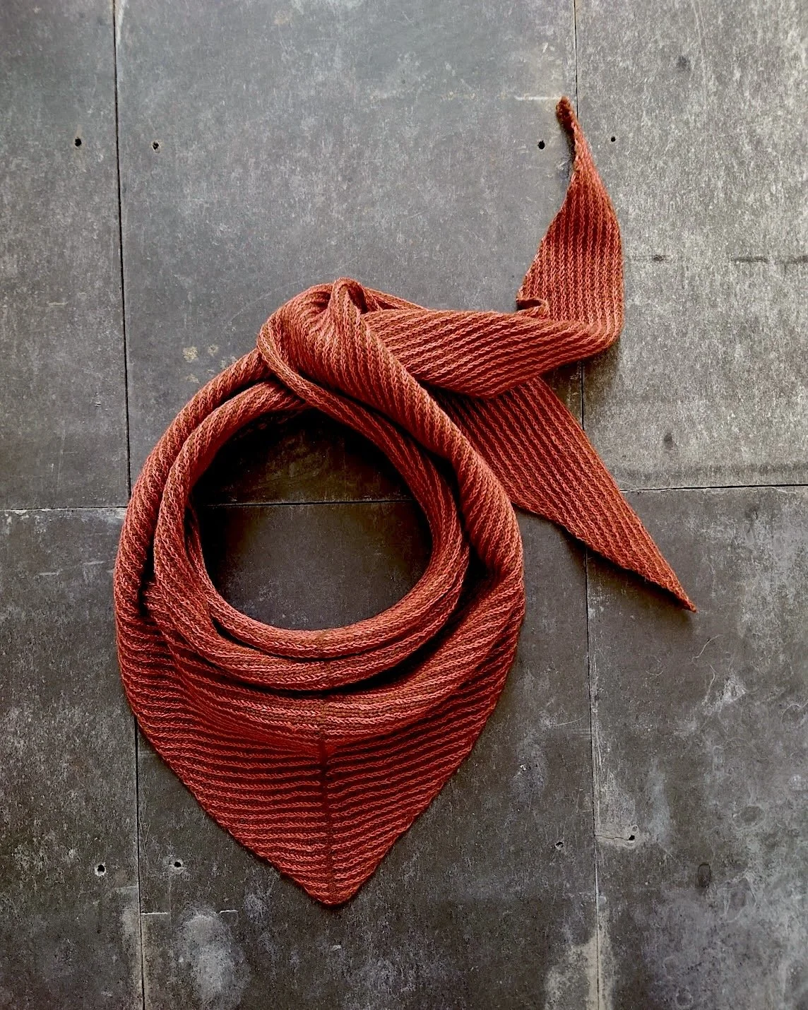 I have recently added this pairing of chestnut brown lambswool and deep coral linen to the range of limited edition fine striped triangular scarves. 

There is something very summery about a stripe and the addition of linen gives these scarves a silk