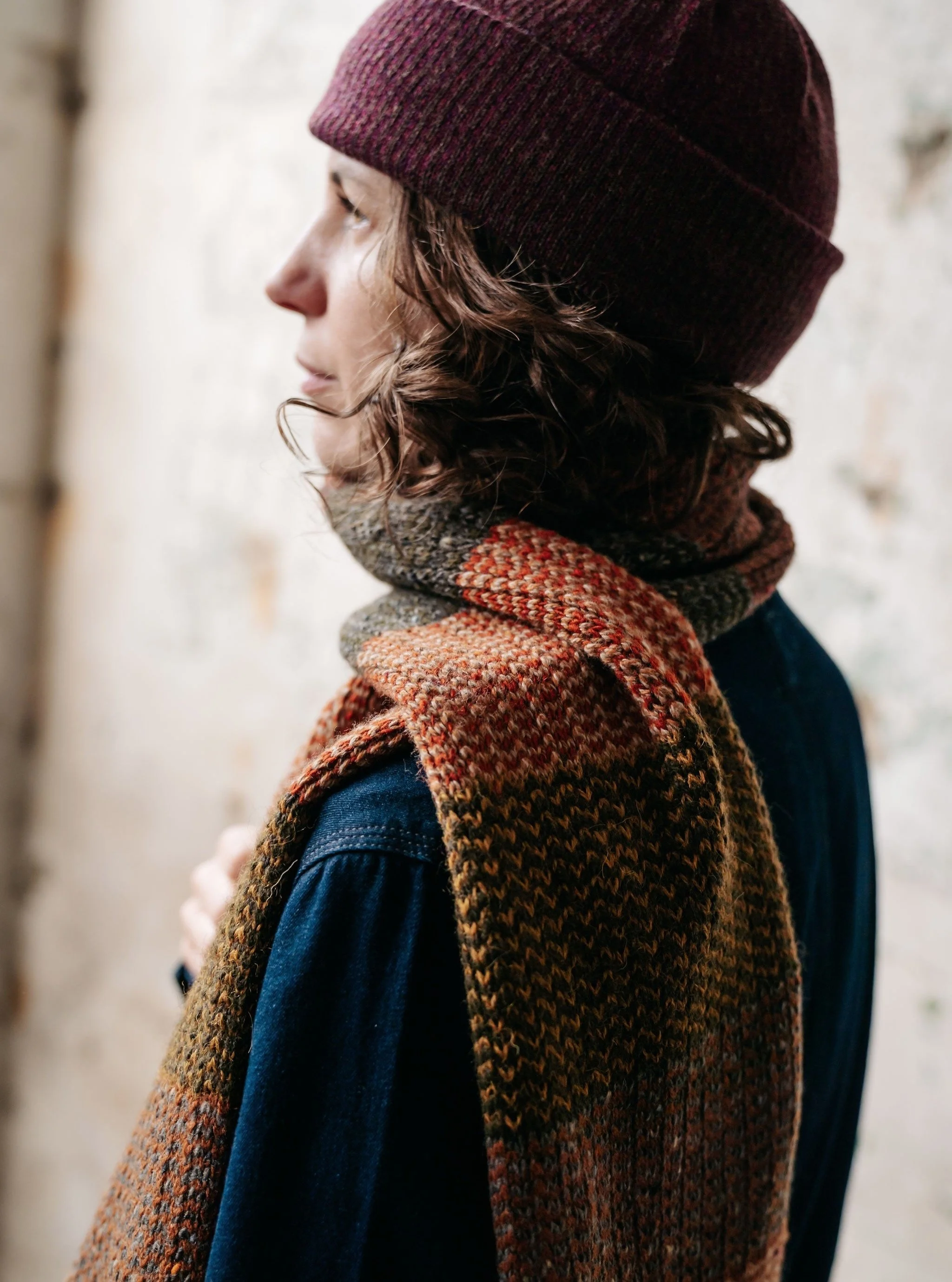 Cocooning woollen layers for the new season crafted on a vintage knitting machine in rich Autumnal tones of blackcurrant, cinnamon, ochre, russet and hickory brown. Photographed by @harri_bentley_photography Worn by @amina_elkouki on location @_josep