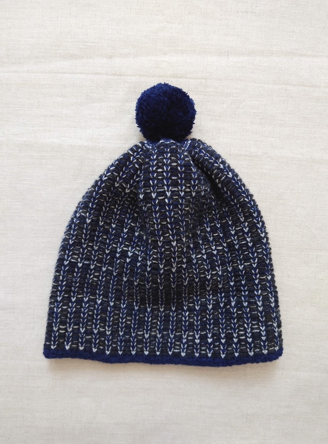 kate-jones-wool-speckle-hat-deepblue-bobble.JPG